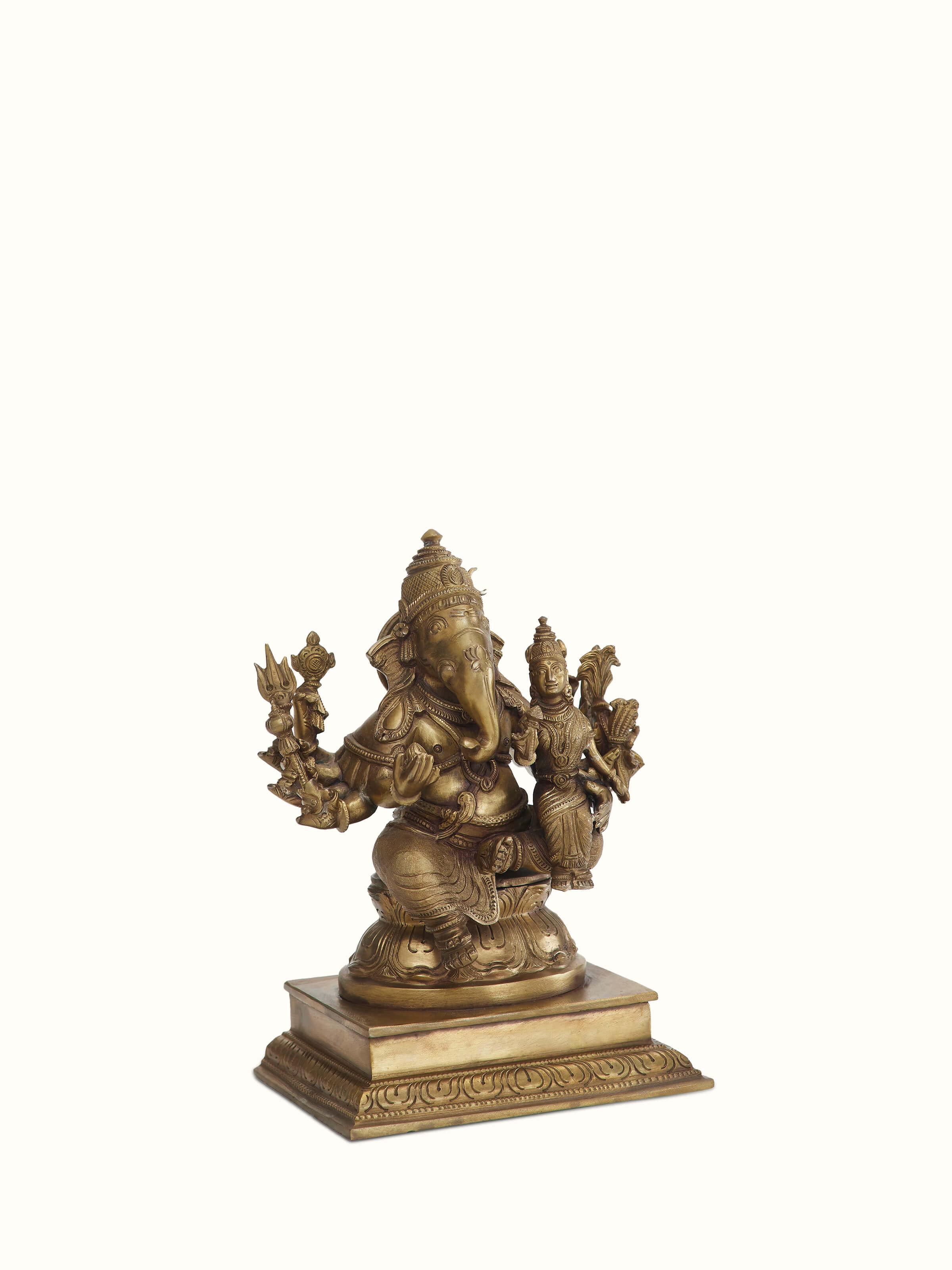 Angled view of Lord Ganesha bronze casting idol emphasizing the rich bronze texture and ornate details.