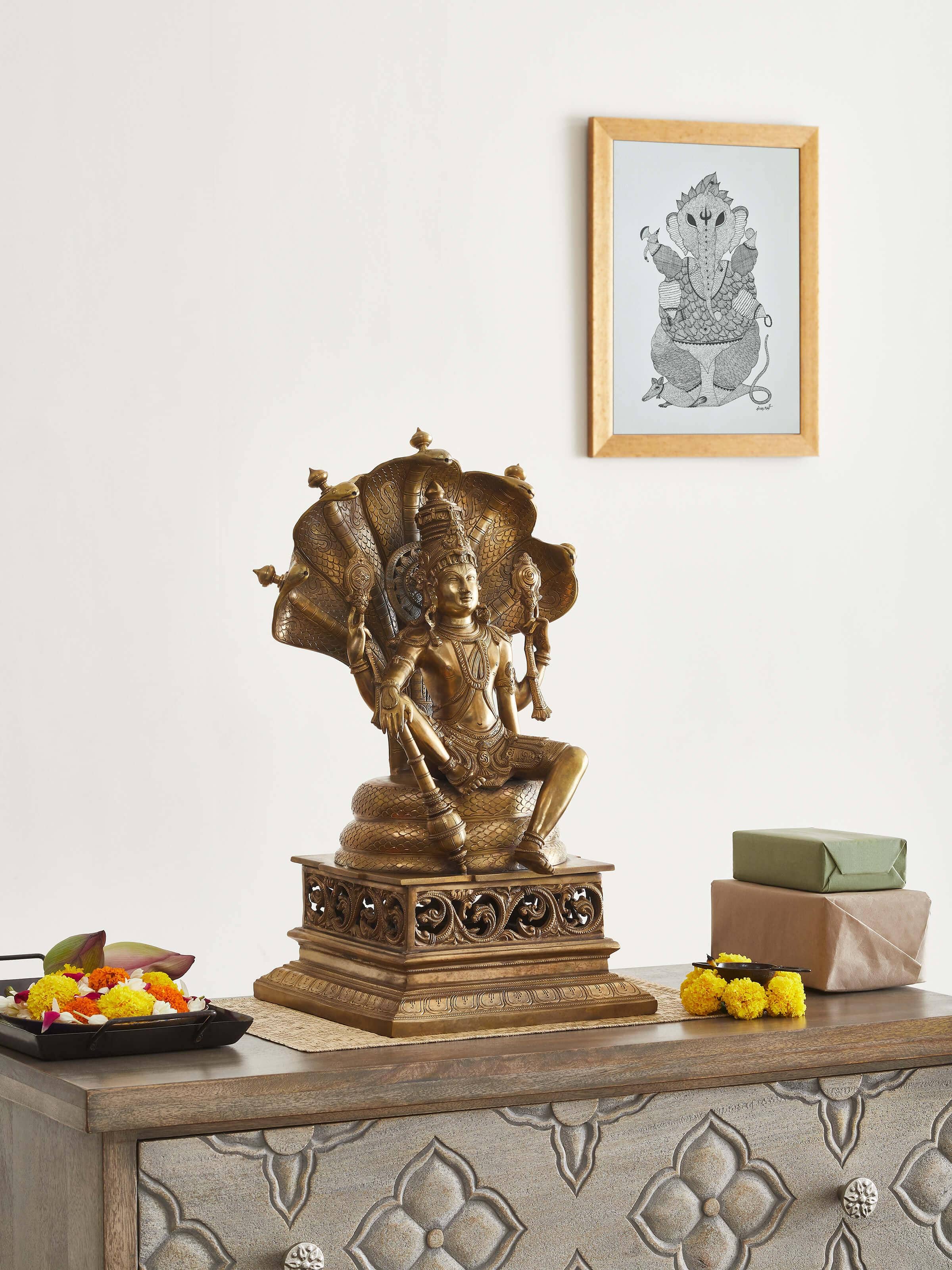 Side view of Ranganatha bronze casting idol emphasizing its elegant design and bronze finish.