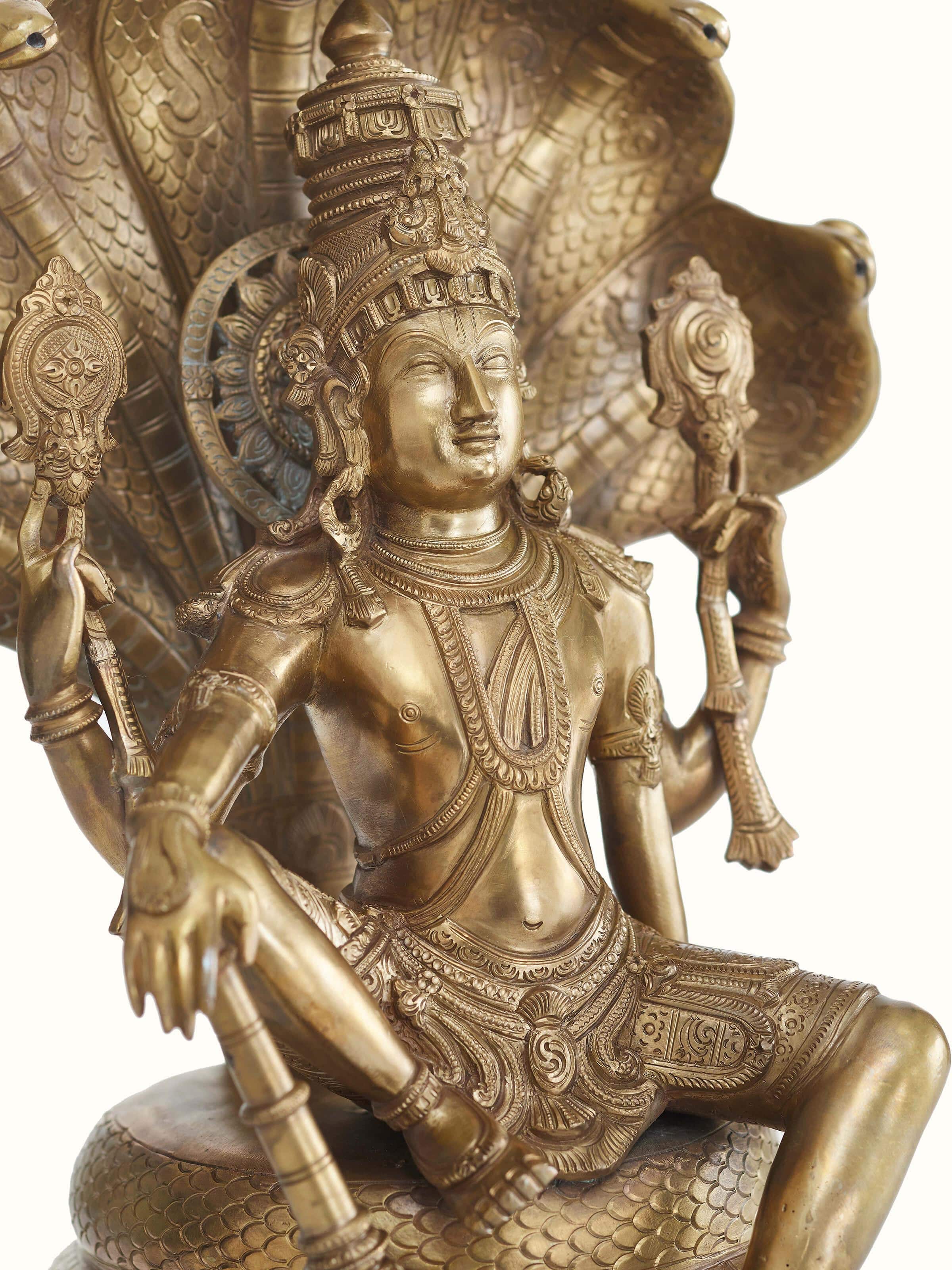 Side view of Ranganatha bronze casting idol showing its fine details and artistic elements.