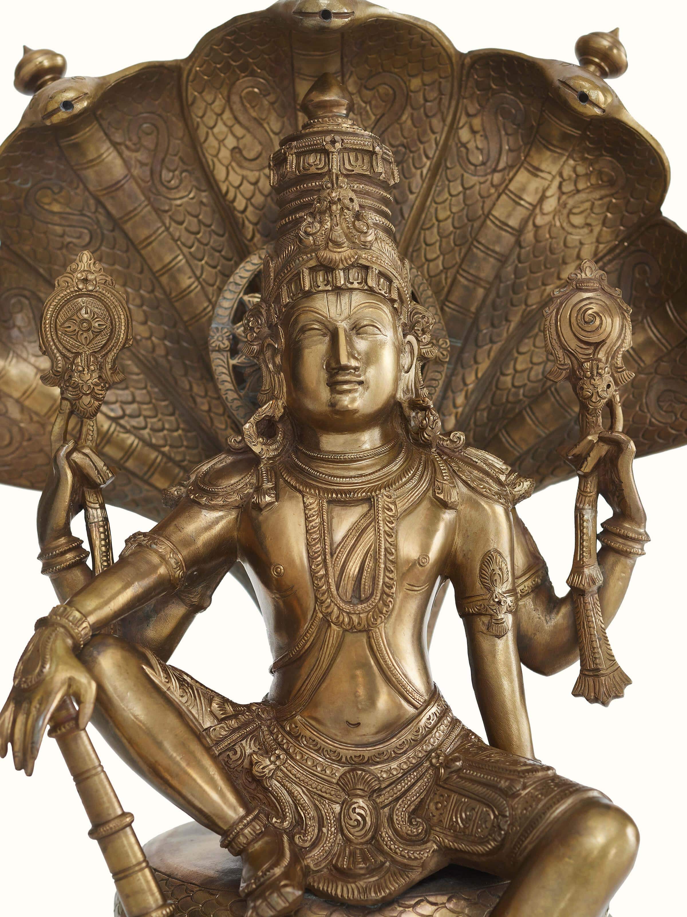 Close-up of Ranganatha bronze casting idol, focusing on the texture and craftsmanship of the bronze.