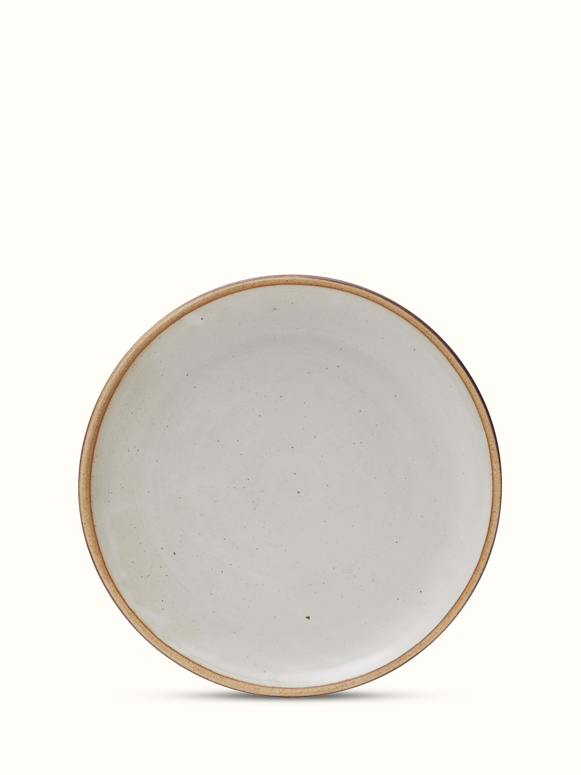 Front view of Studio pottery ceramic dinner plate white displaying its clean design and smooth ceramic surface