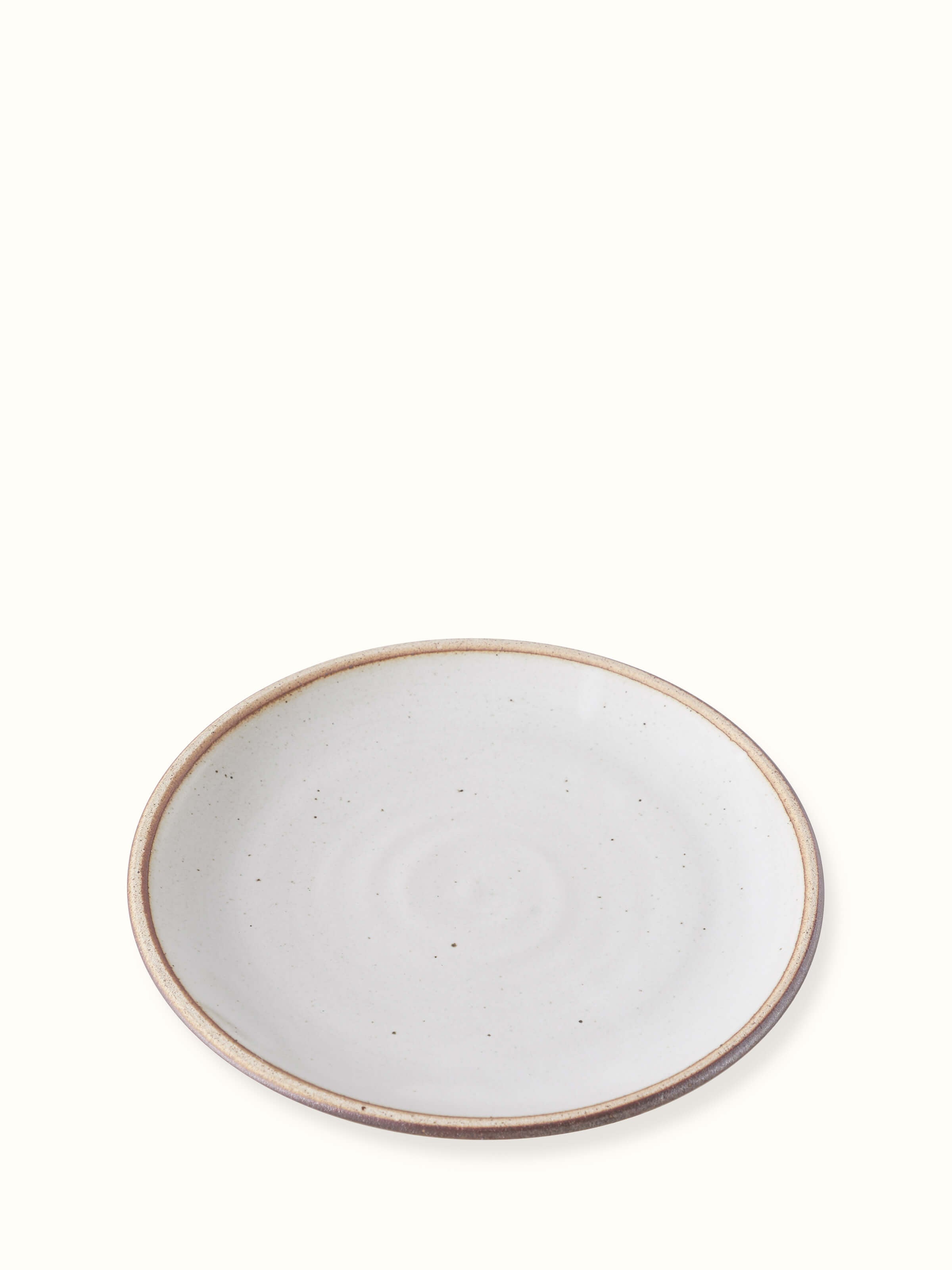 Detailed view of studio pottery ceramic quarter plate, showcasing its elegant and artistic glaze.
