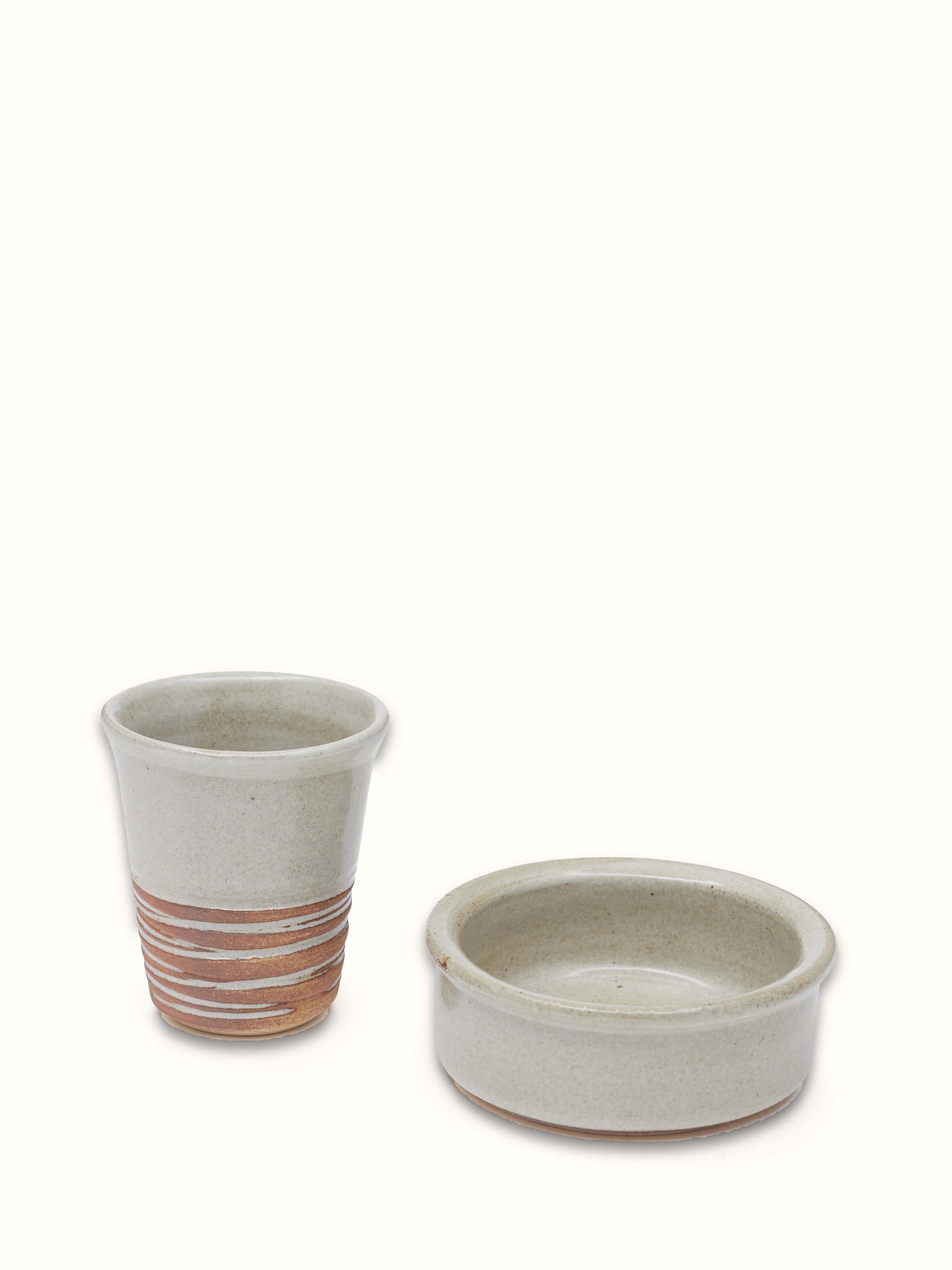 Angle view of Studio pottery ceramic filter coffee mugs (2 pcs) emphasizing their artistic details.