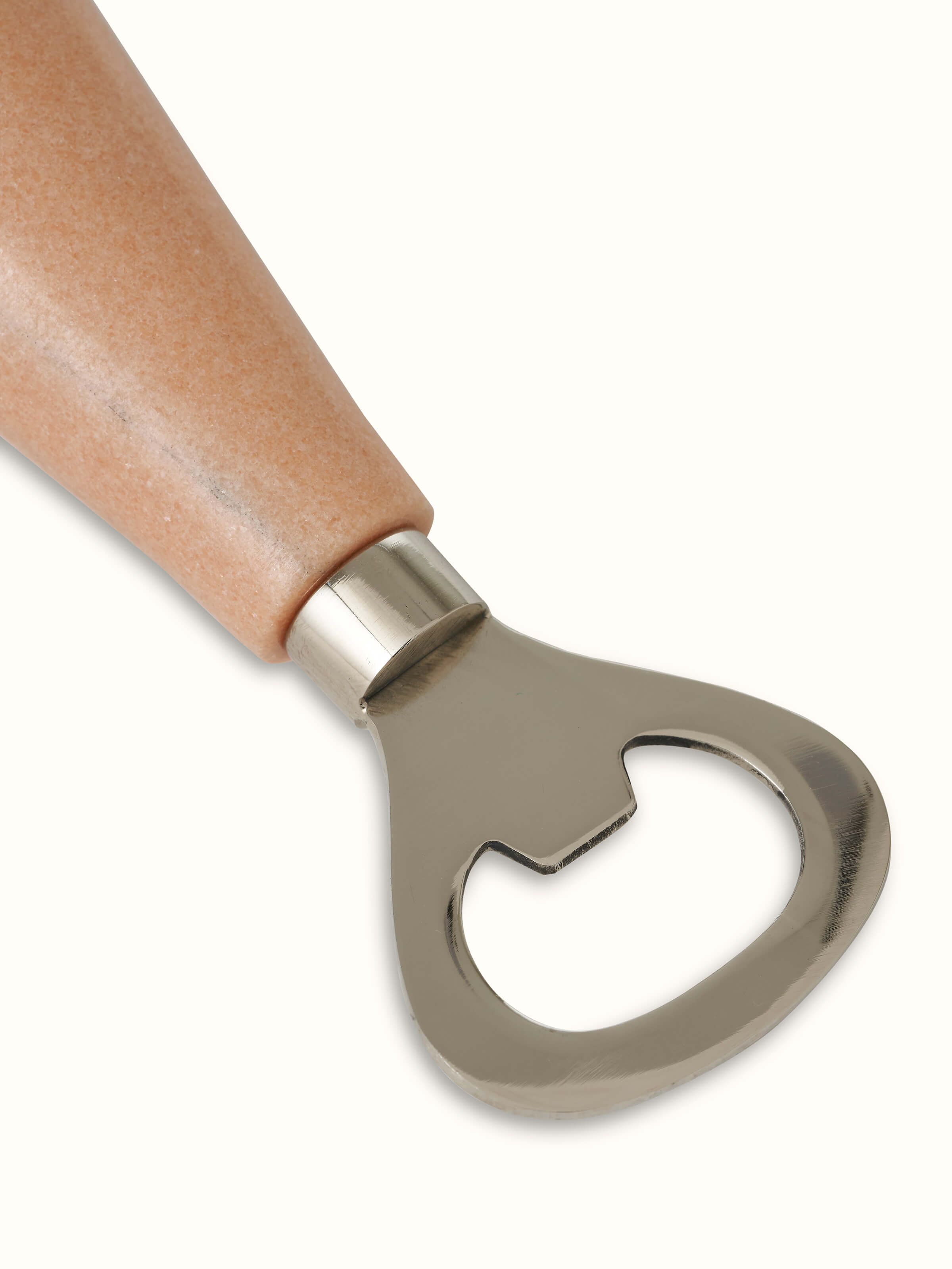 Detailed view of Marble & stainless steel bottle cap opener in brown, focusing on material and craftsmanship.