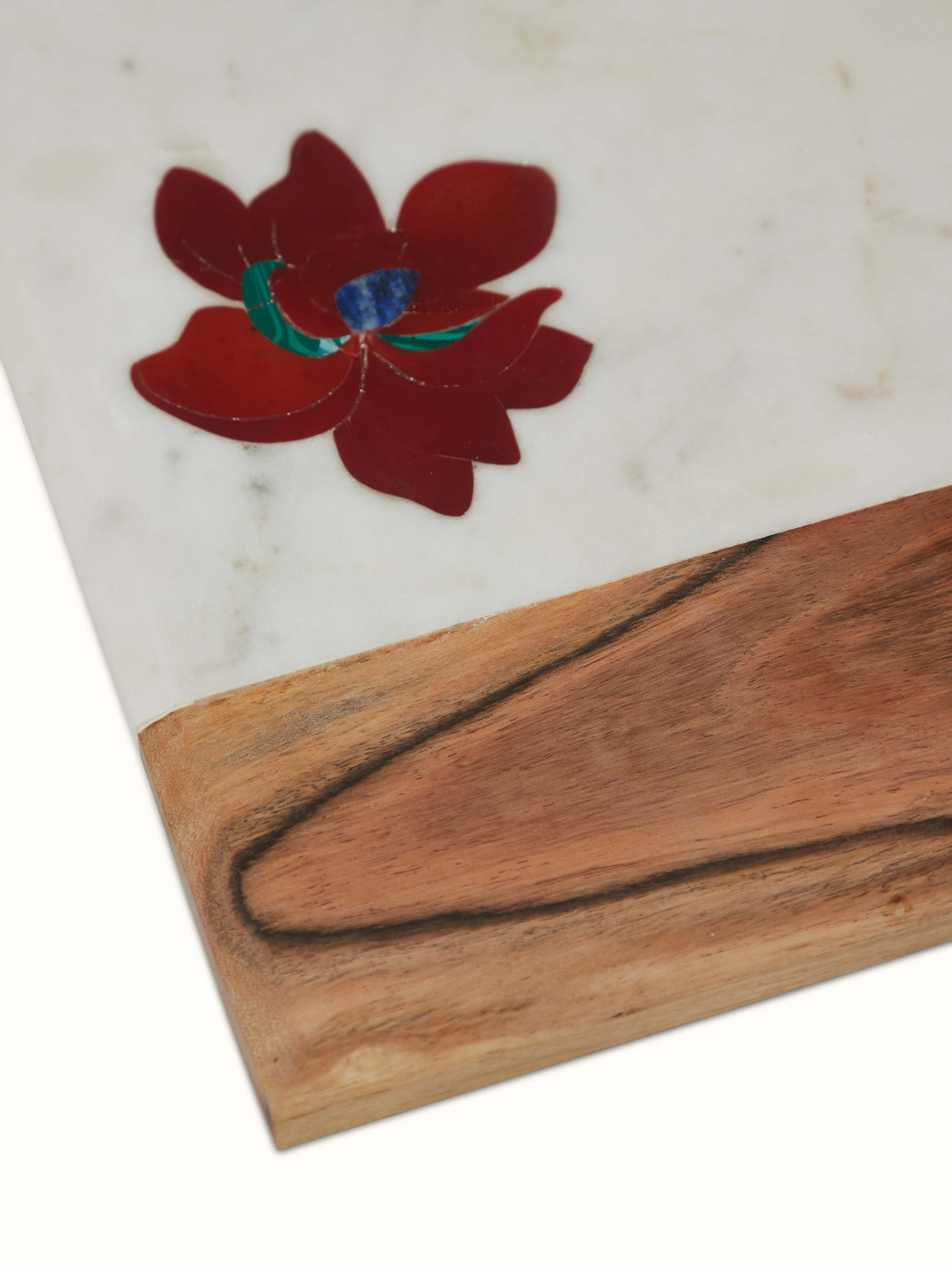 Detailed view of the marble and coloured stone chopping board, showing its fine details and surface.