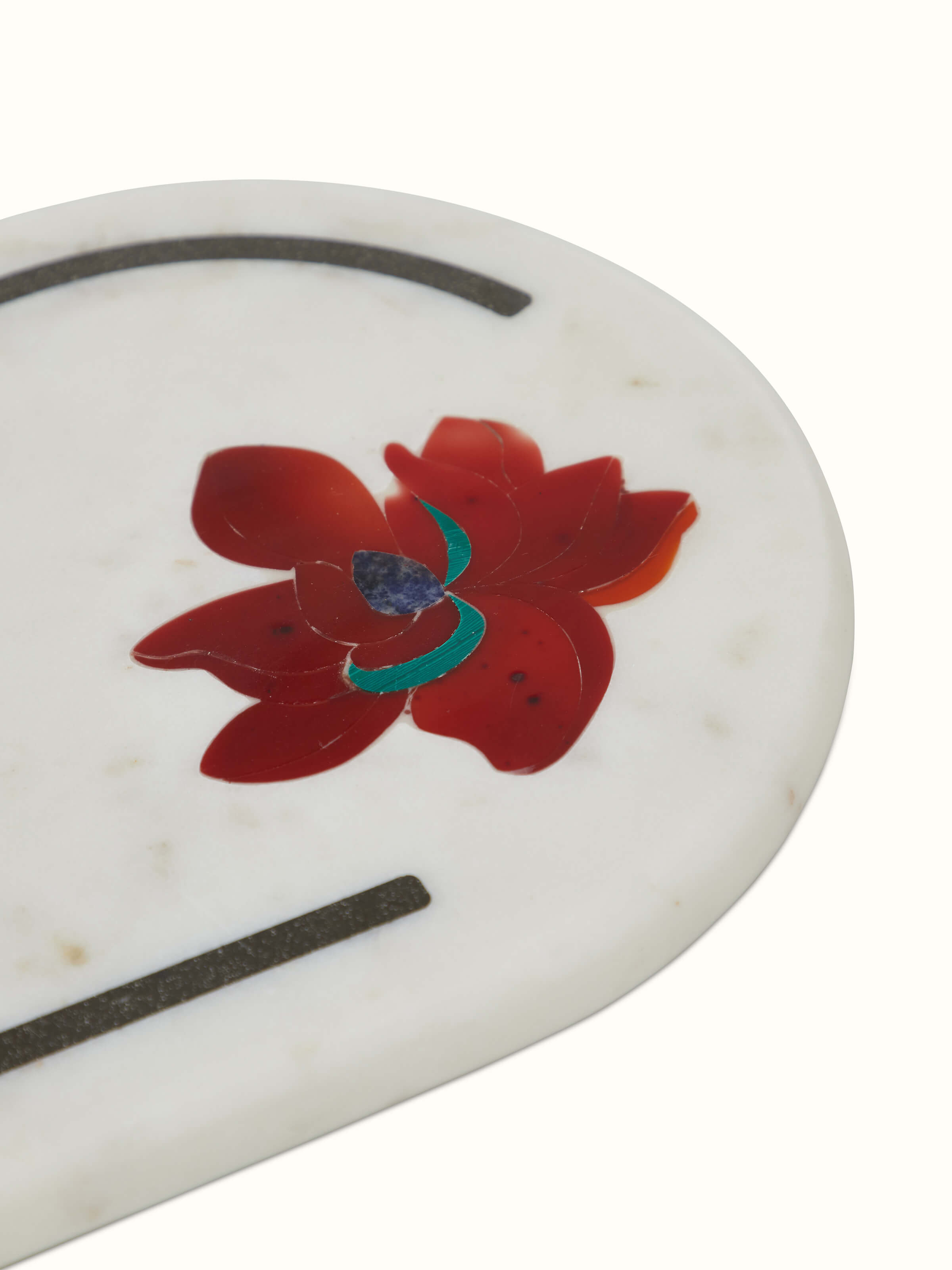 Close-up view of Marble & coloured stone cheese board highlighting the detailed stone patterns and smooth surface.