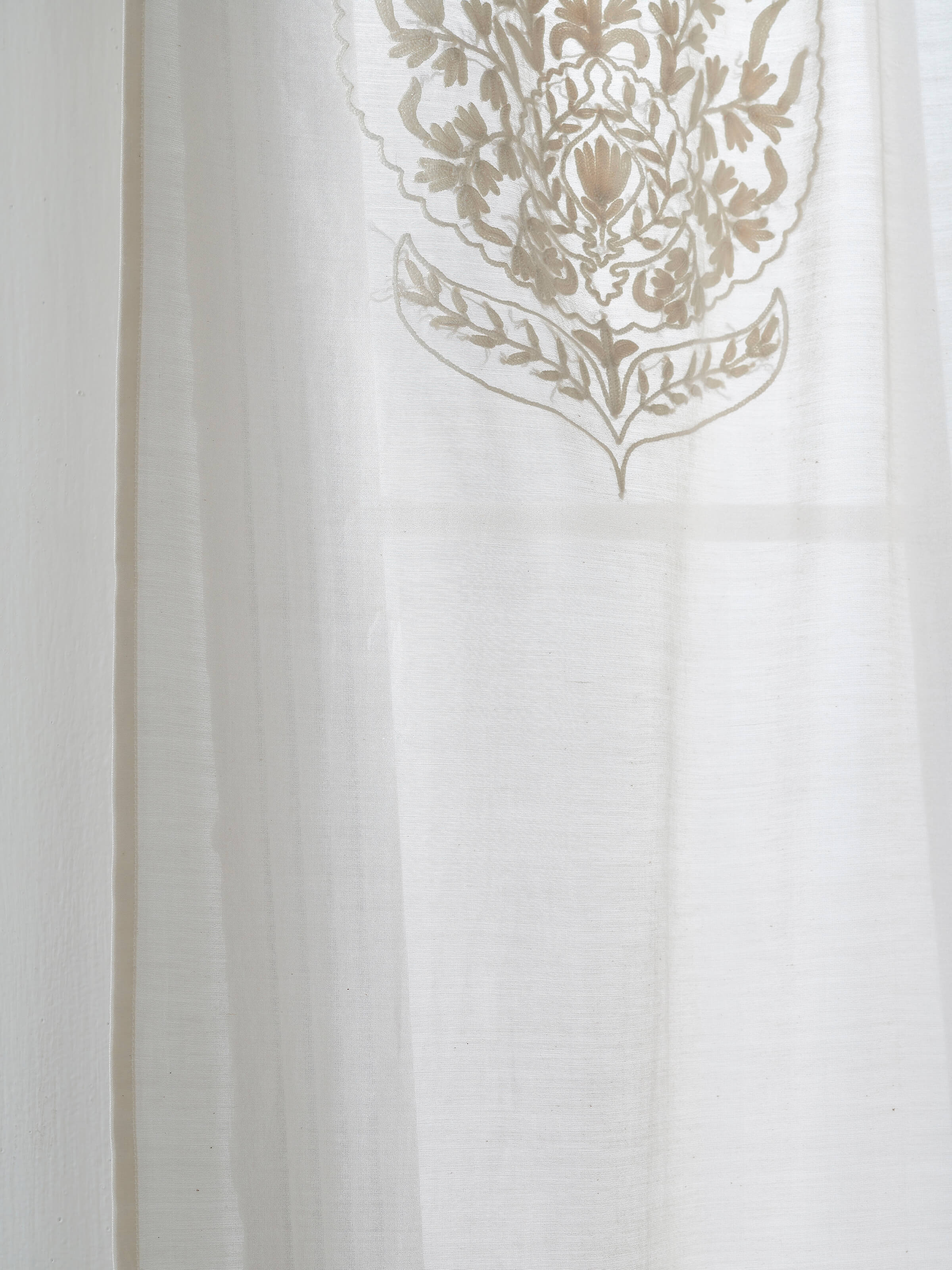 Full view of Razza ivory buta cotton silk crewel hand embroidered sheer curtain (9 ft) in a window setting