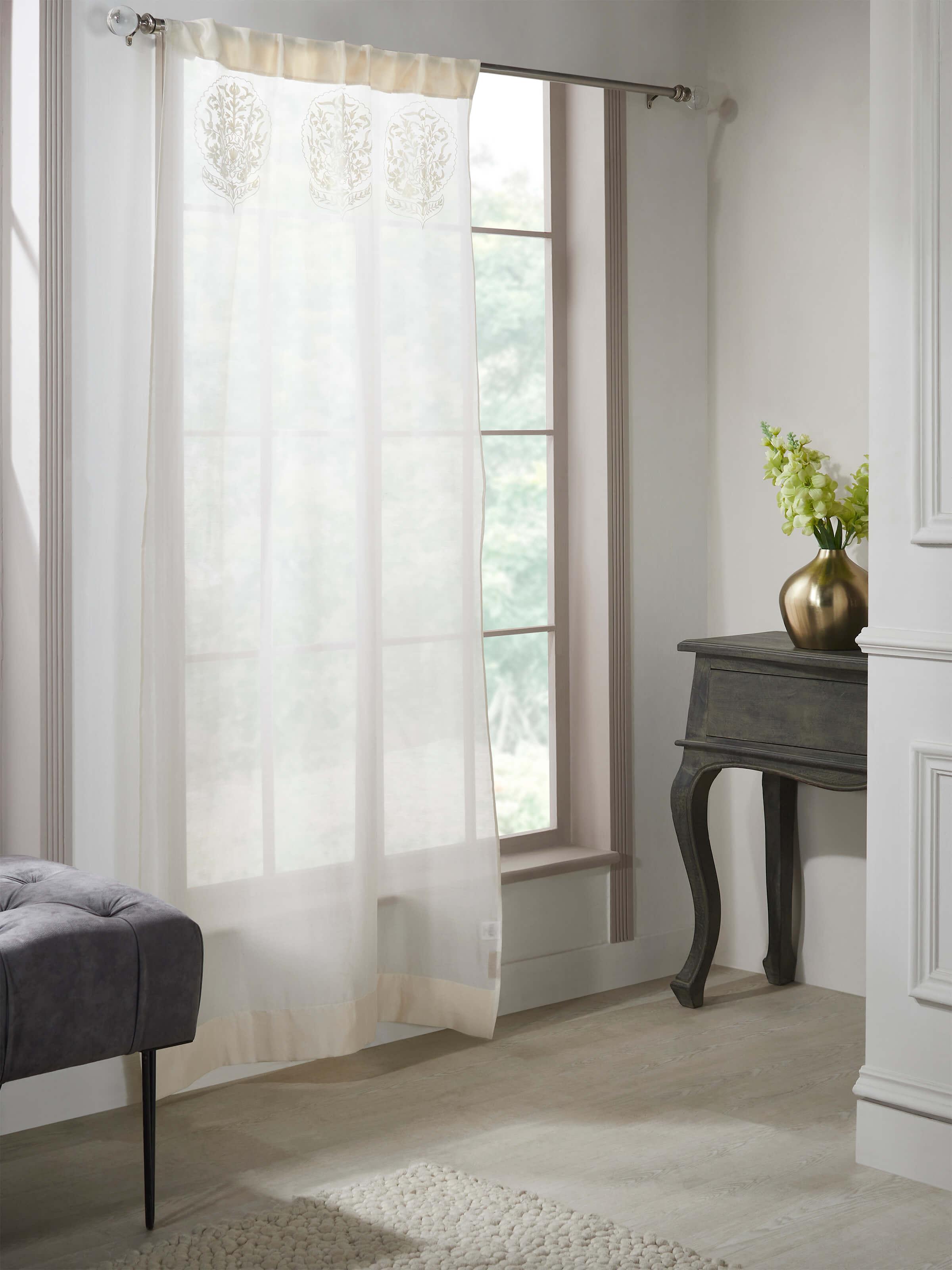 Lifestyle view of Razza Ivory Buta Curtain hanging gracefully in a serene interior setting.