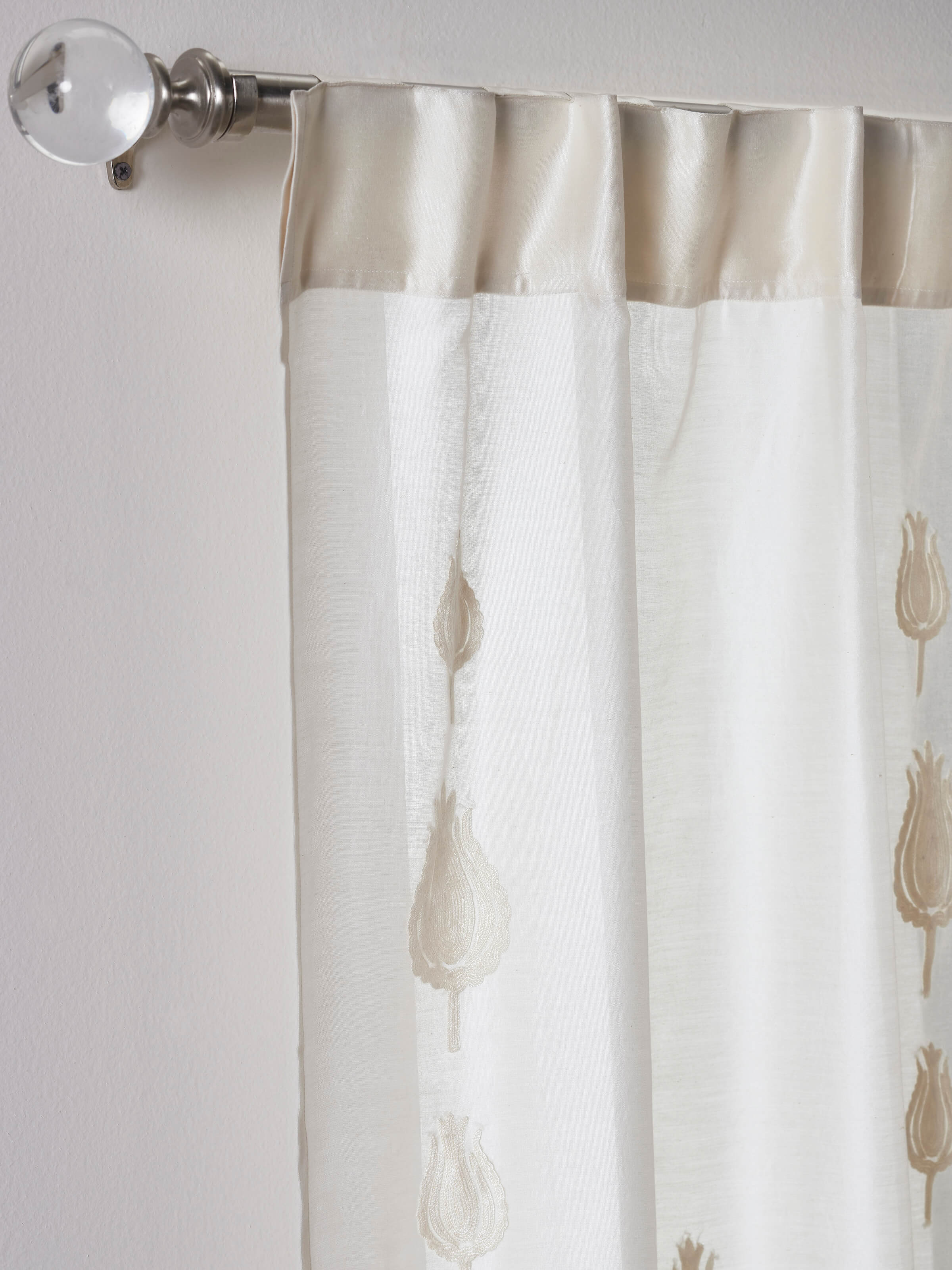 Front view of Razza ivory tulip buti cotton silk crewel hand embroidered sheer curtain showing the delicate embroidery and sheer fabric.