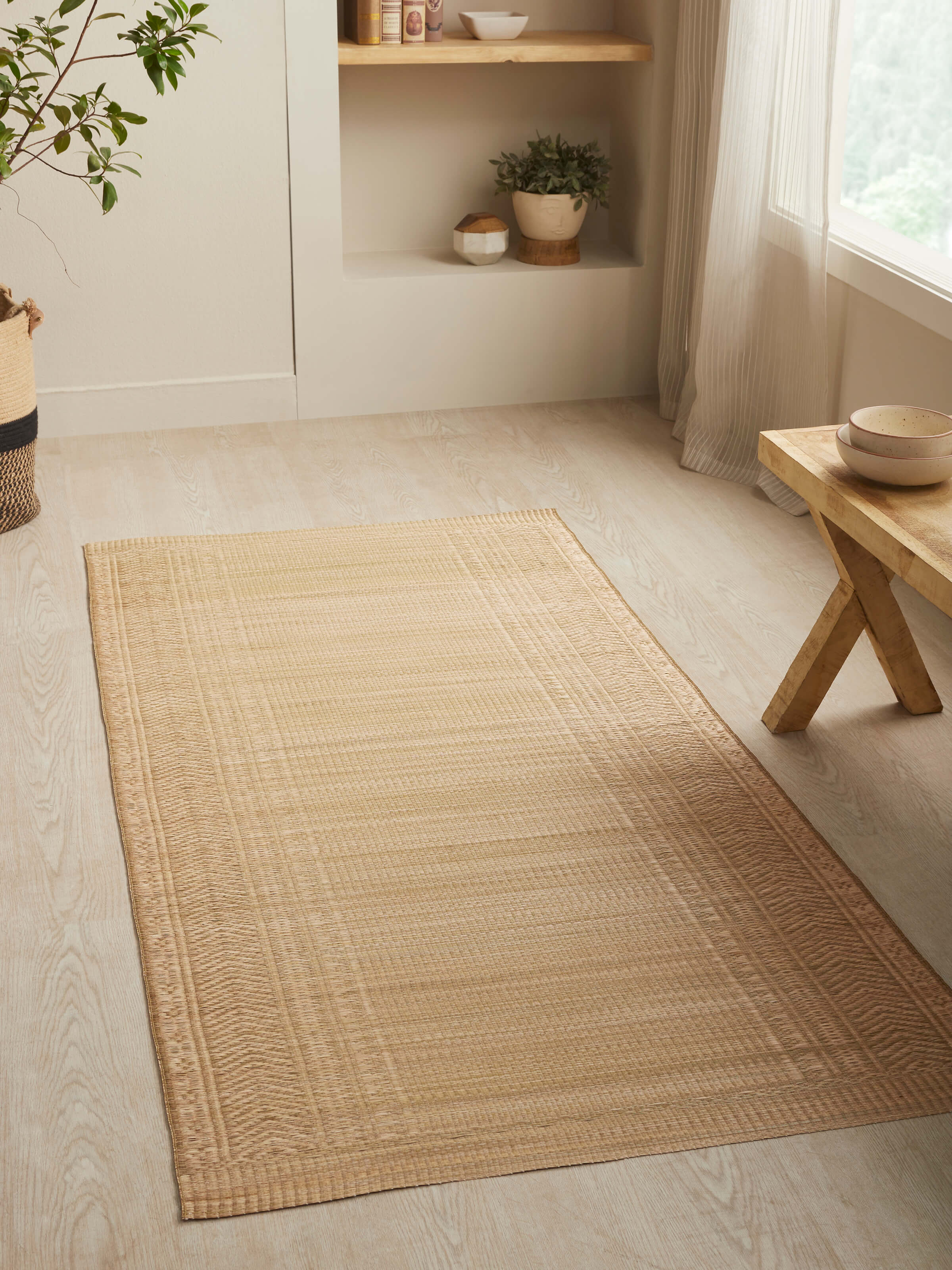 Side view of Folk geo beige West Bengal madurkathi natural fibre mat emphasizing its natural fiber and intricate weave.