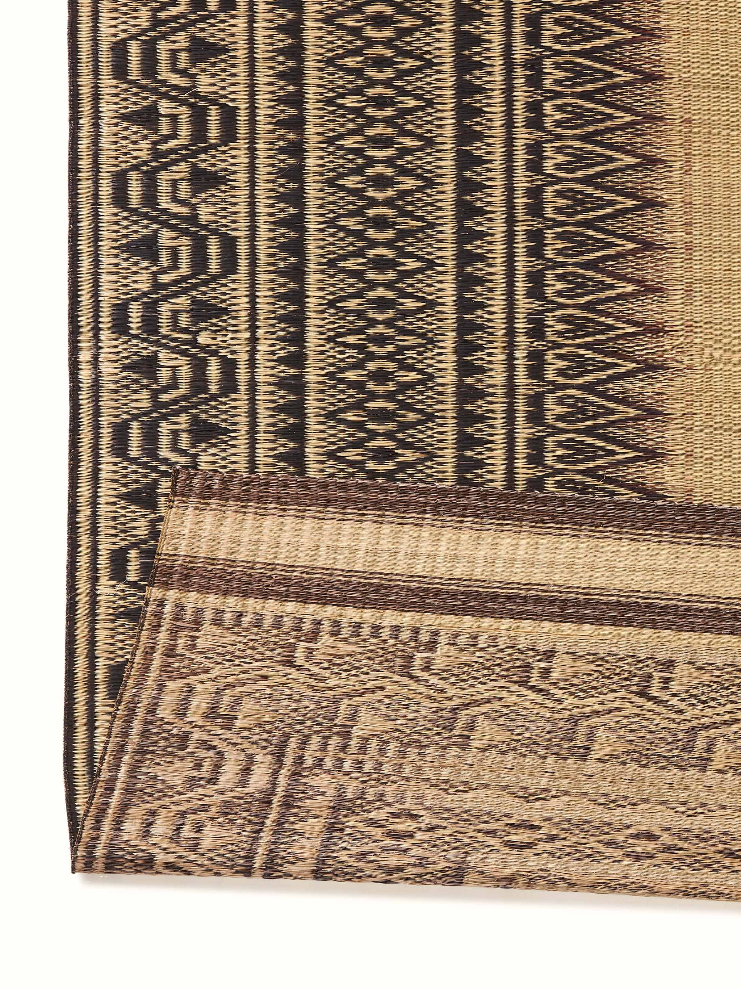Back view of Folk Geo Black West Bengal Madurkathi Natural Fibre Mat revealing the backing and overall construction.