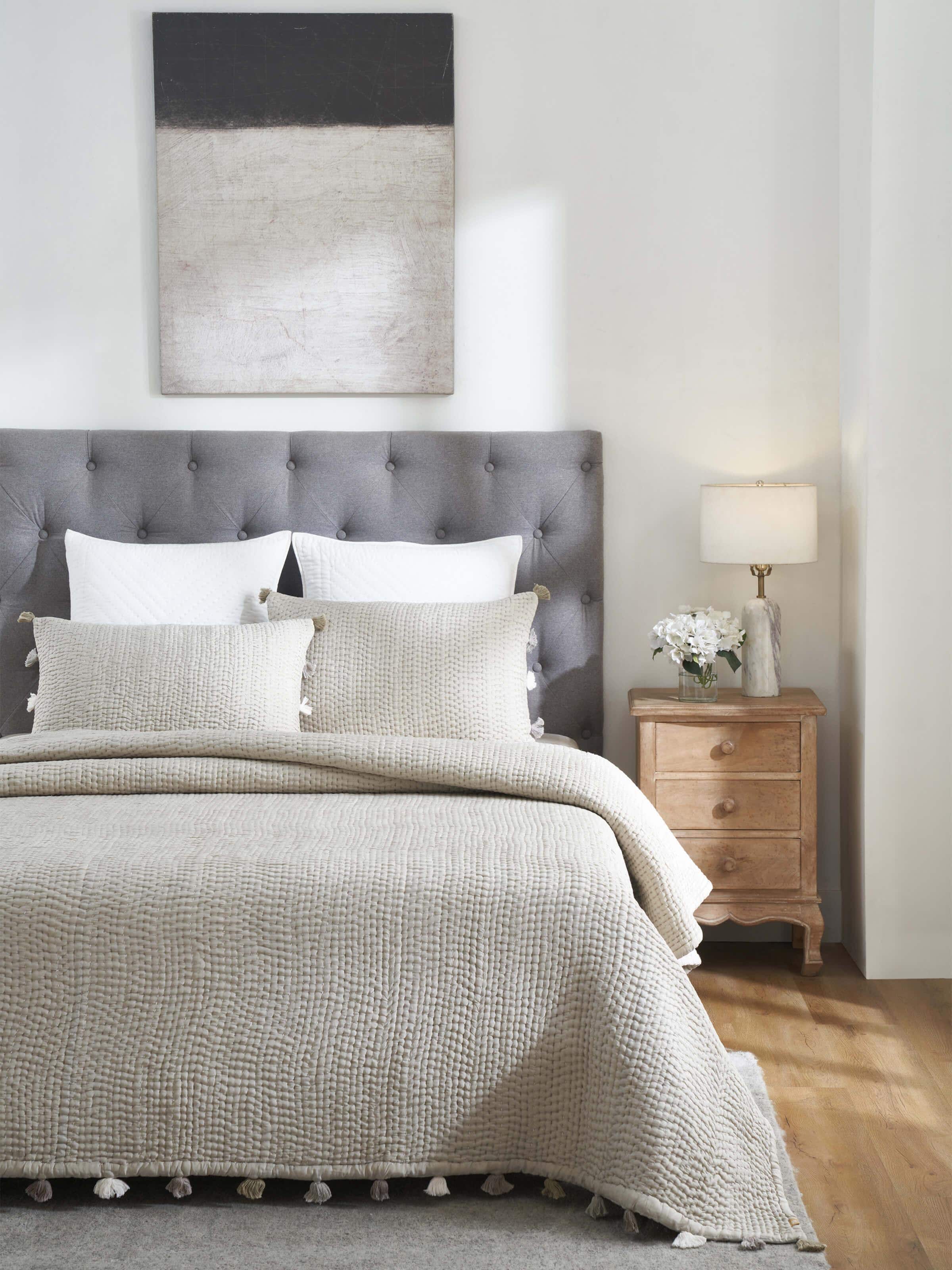 Close-up of Ahilya grey textured silk razai embroidered double bedspread set, focusing on the intricate embroidery and silk texture.