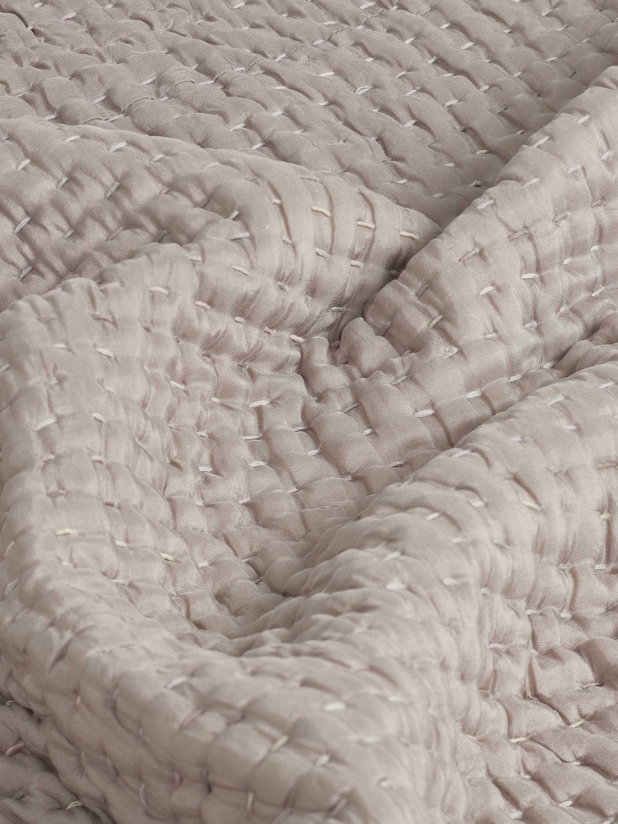 Side view of brown textured silk razai embroidered double bedspread set, focusing on the elegant embroidery and fabric quality.