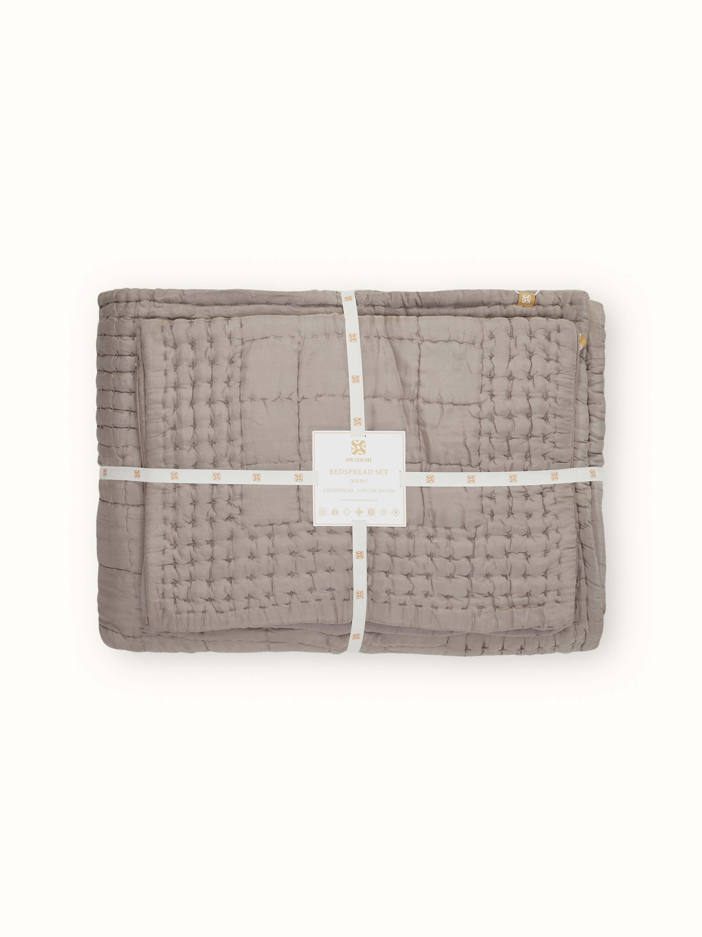 Pipa Grey Solid Silk Razai Bedspread Set arranged with visible embroidered patterns, emphasizing the luxurious silk texture.