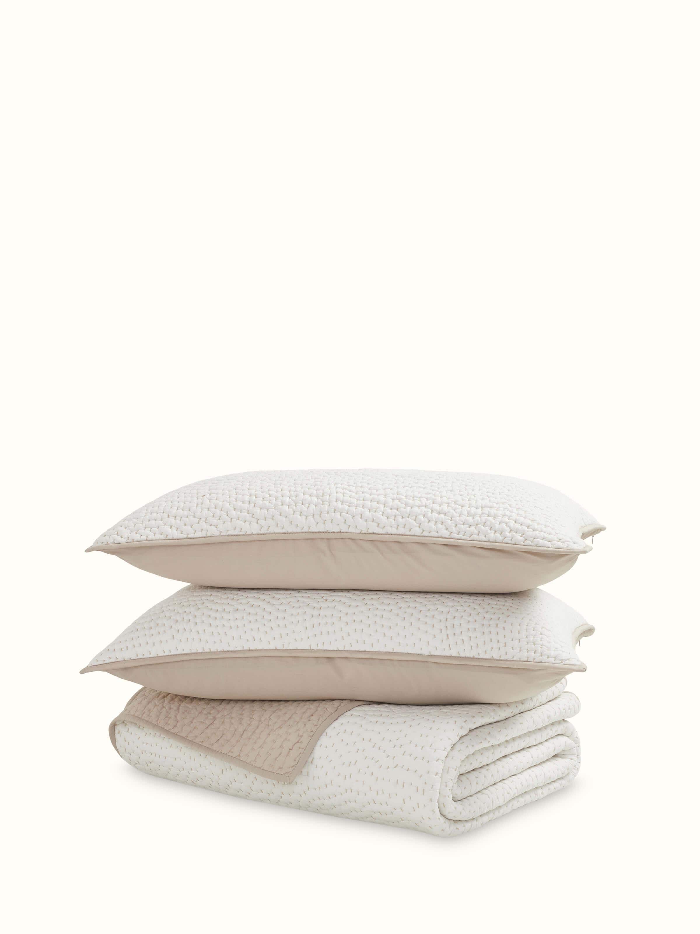 Front view of Nityam Ivory Two-Tone Textured Cotton Razai Embroidered Double Bedspread Set showcasing texture and design.