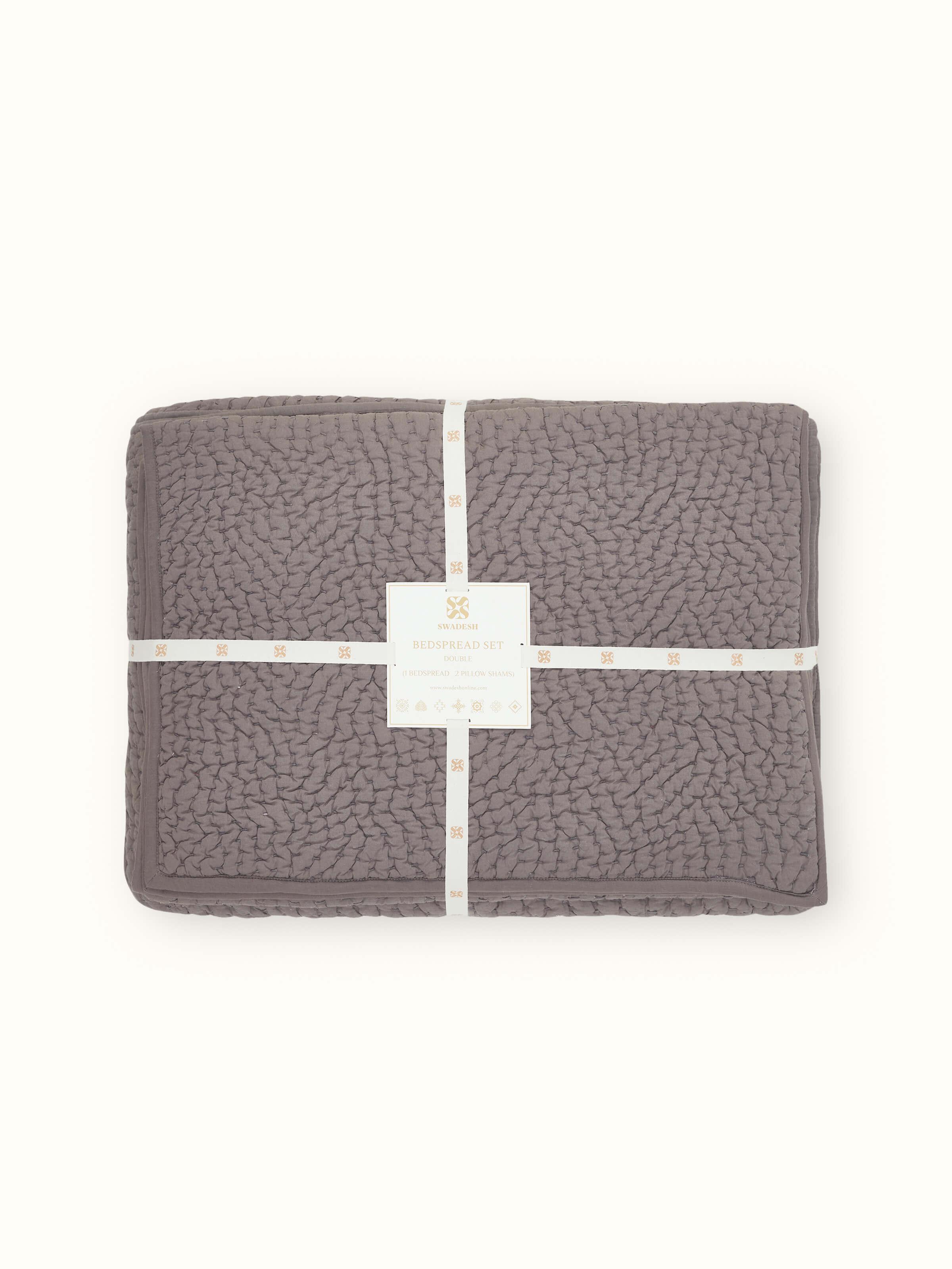 Detail shot of Nityam grey textured cotton razai double bedspread set (3 pcs) showing the embroidery pattern