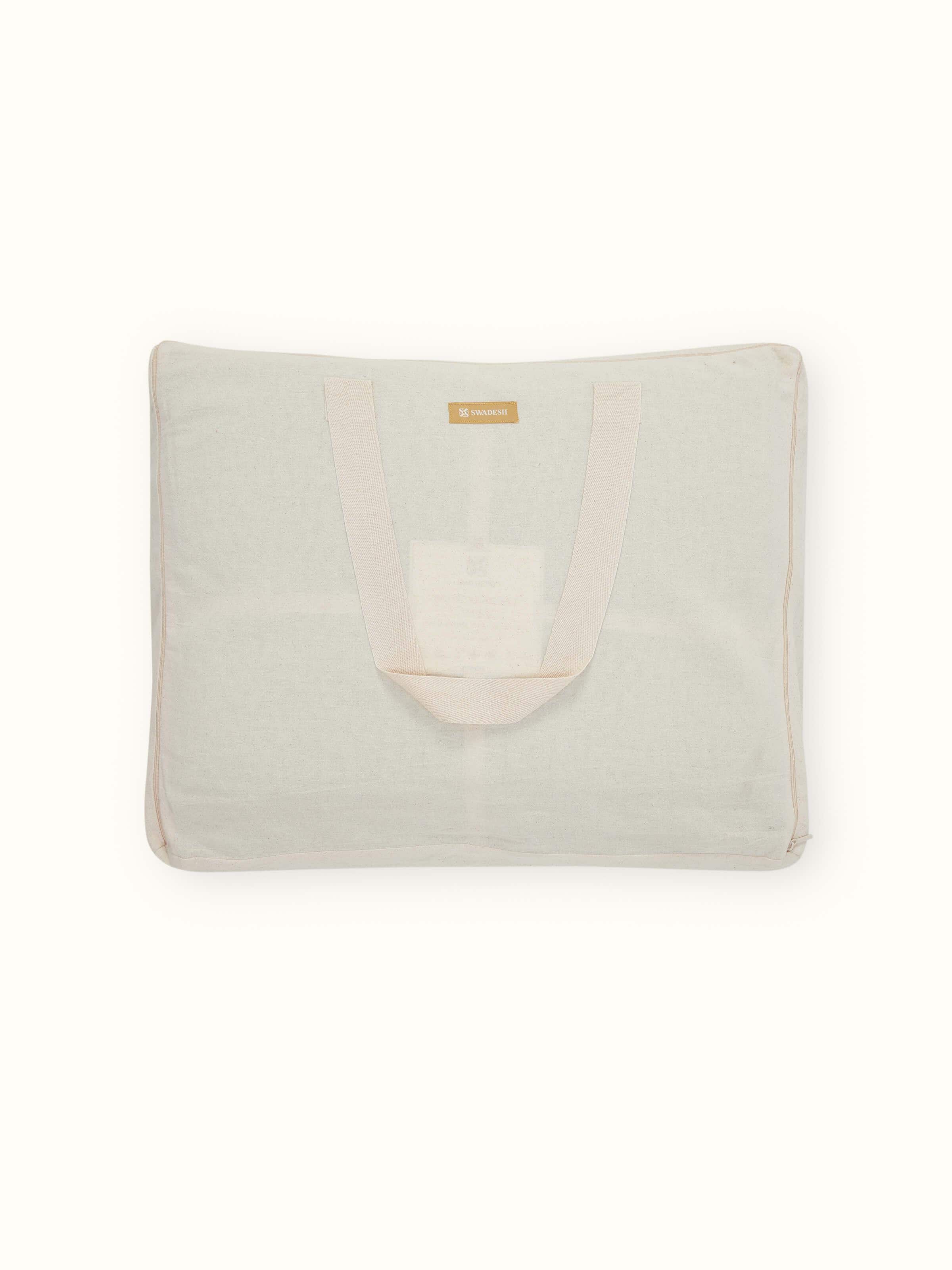 Side view of Nityam Light Green Two-Tone Textured Cotton Razai Embroidered Double Bedspread Set, showing the depth and texture of the fabric.