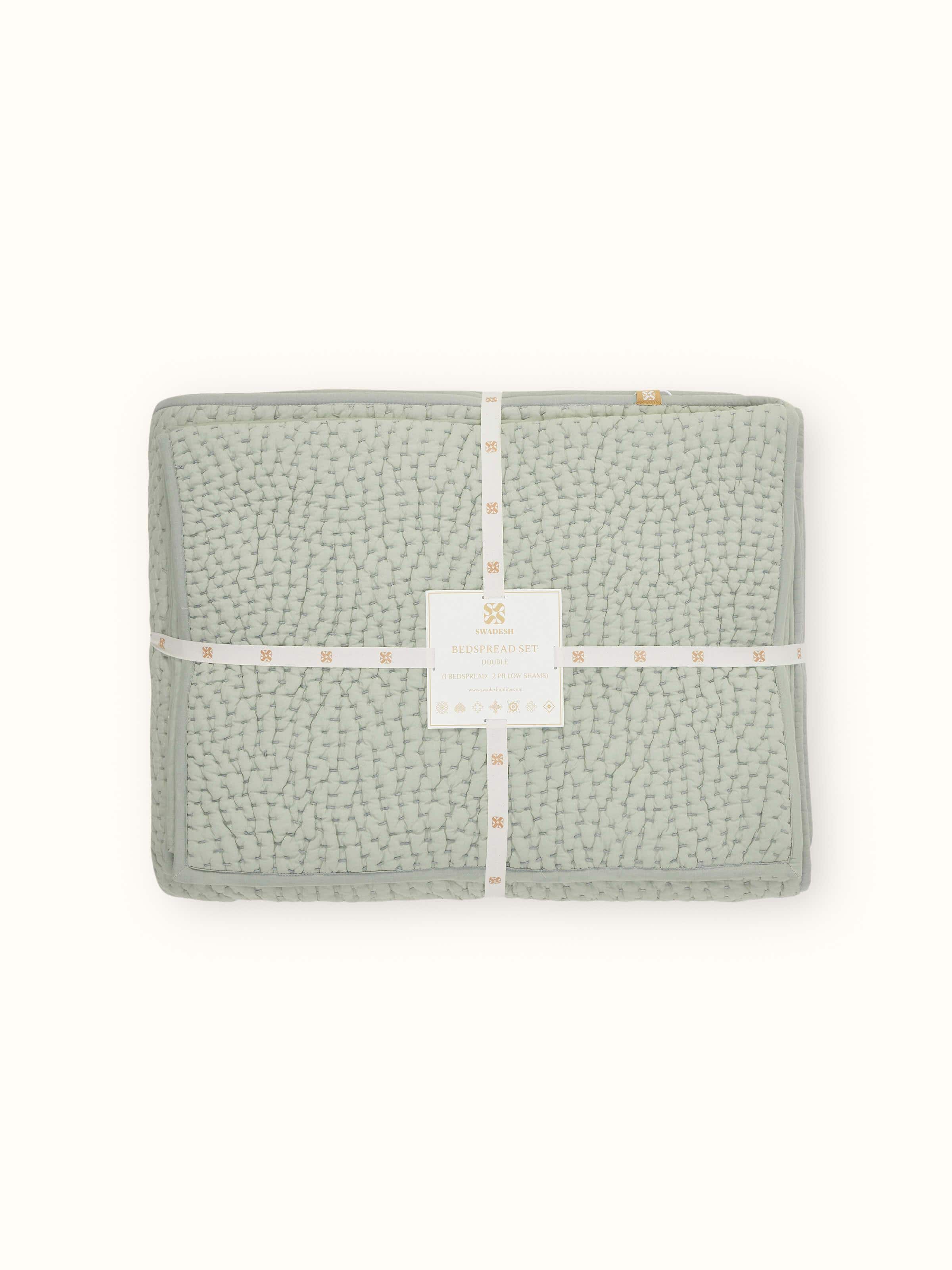 Detailed view of Nityam Light Green Two-Tone Textured Cotton Razai Embroidered Double Bedspread Set, focusing on the embroidery and fabric texture.
