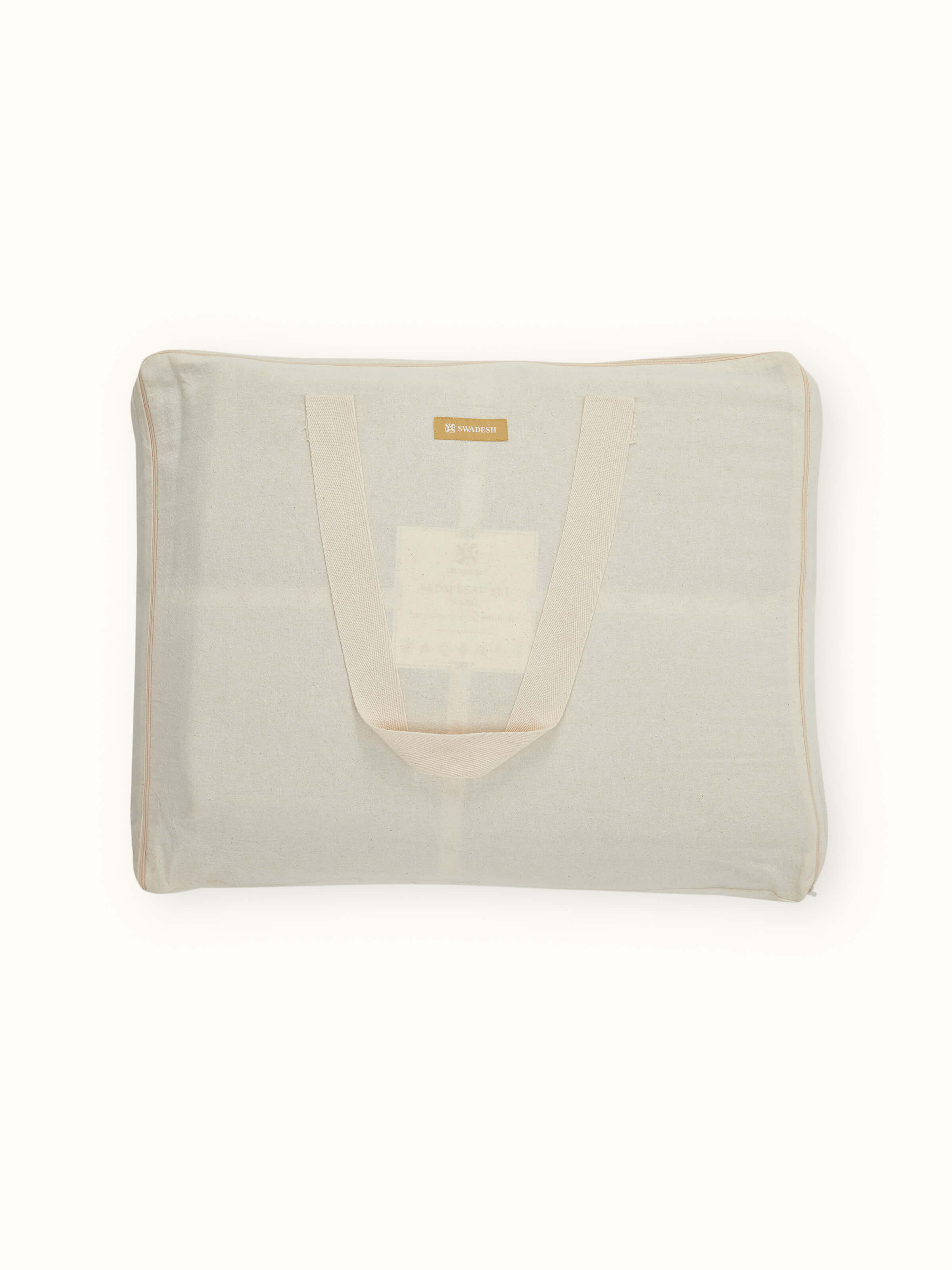 Close-up of Vaayu beige chambray textured cotton razai embroidered double bedspread set displaying its rich texture