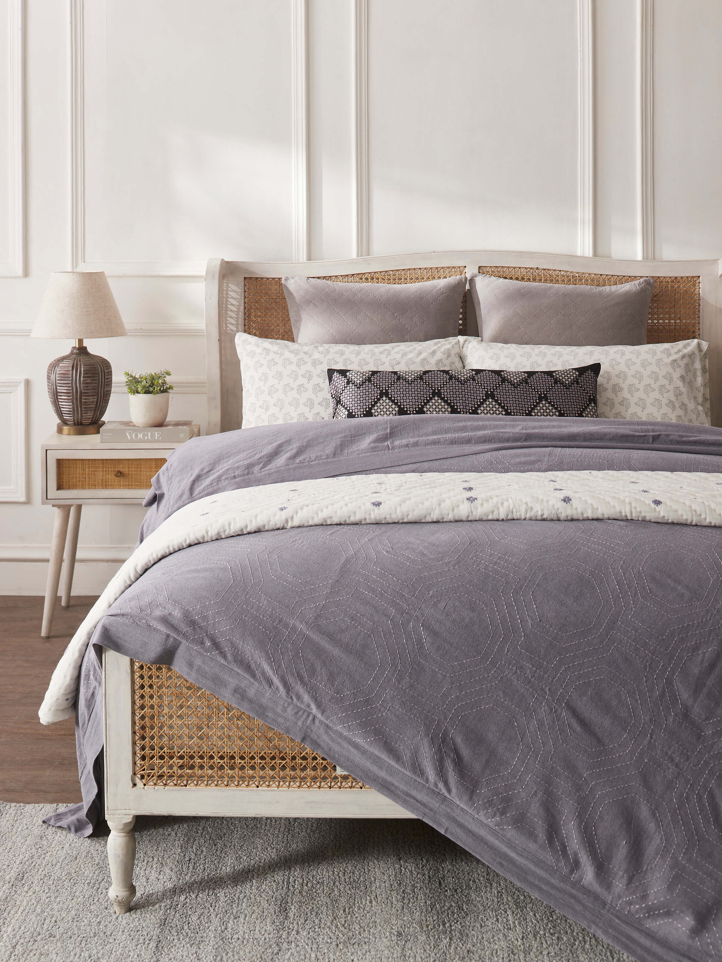 Angled view of Kahani grey geometric cotton kantha embroidered queen duvet cover showcasing design details