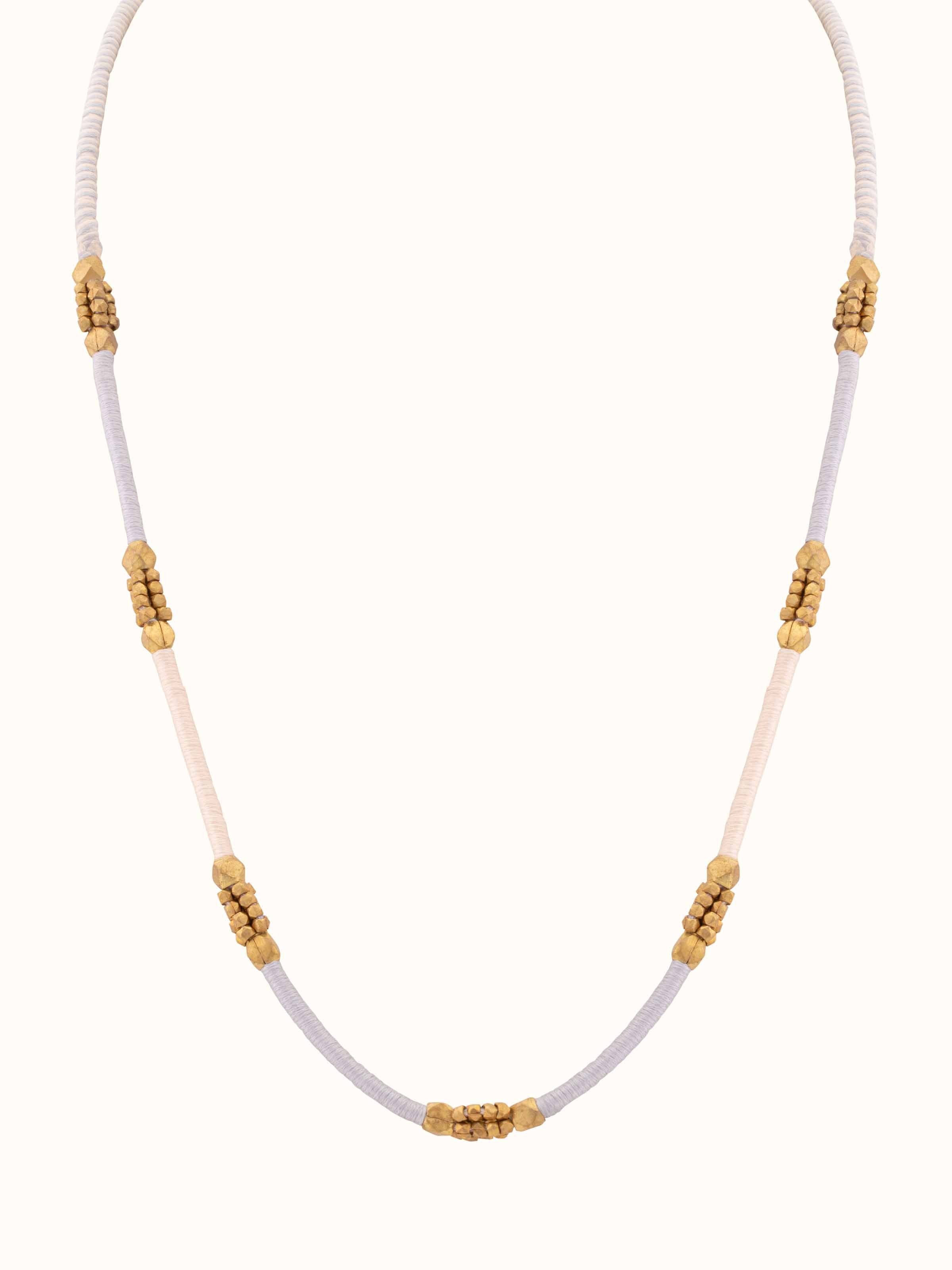 Front view of Dhokra Long Necklace featuring traditional Dhokra metalwork with intricate designs and rich detailing.
