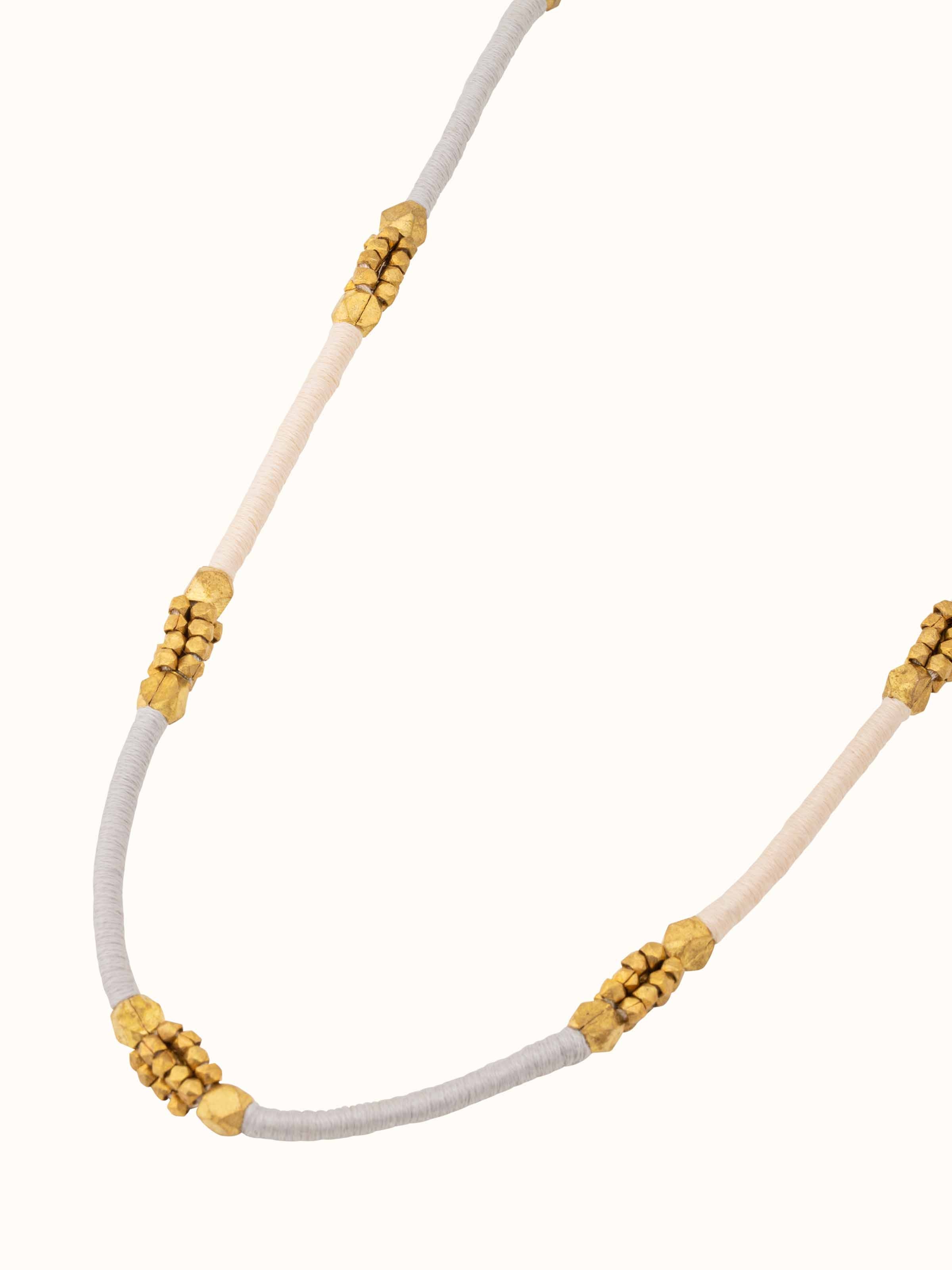 Back view of Dhokra Long Necklace focusing on the clasp and overall traditional design.