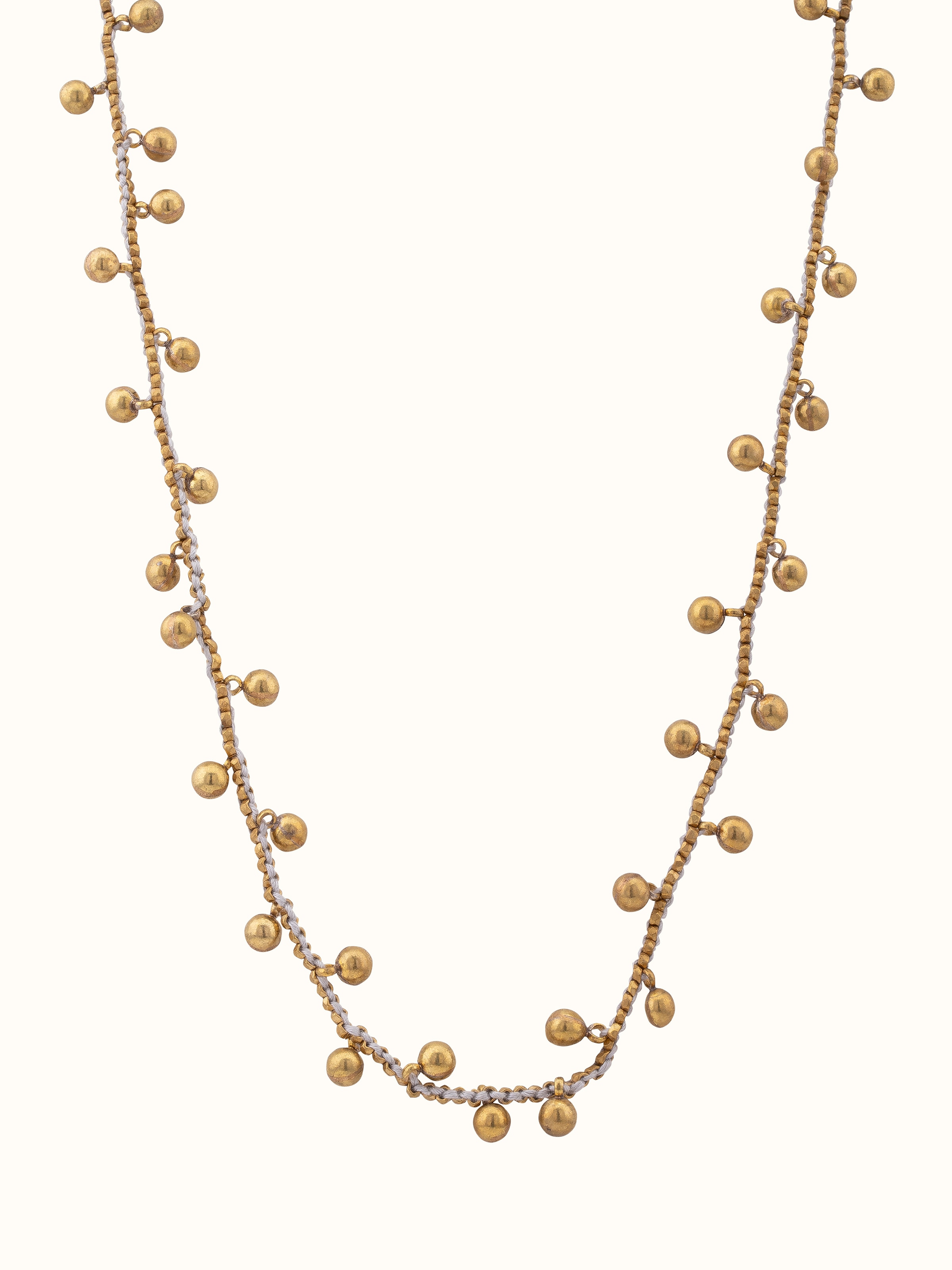 Front view of Dhokra long necklace showcasing its traditional design and intricate Dhokra craftsmanship