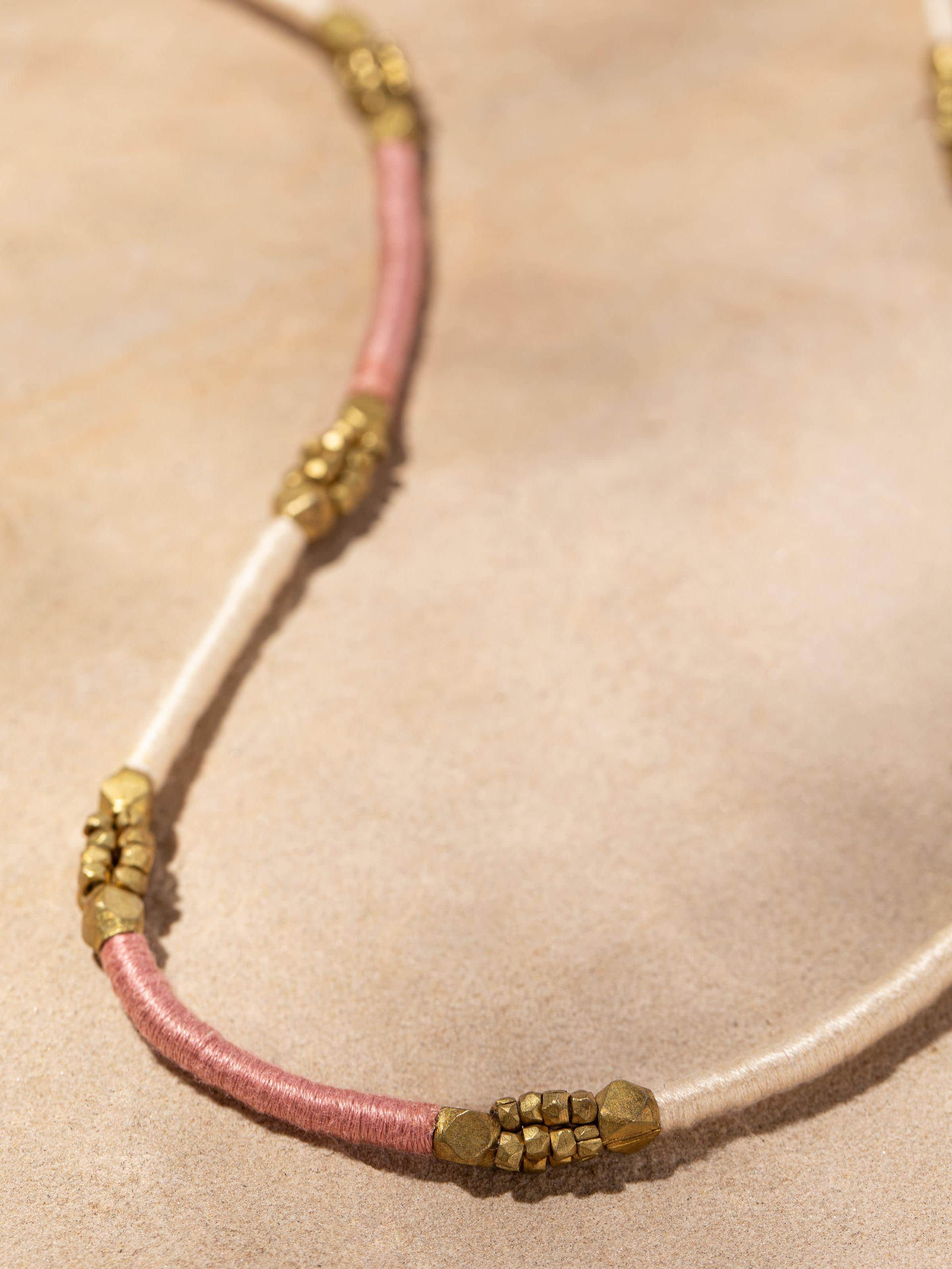 Back view of Dhokra Long Necklace displaying the clasp and detailed design.