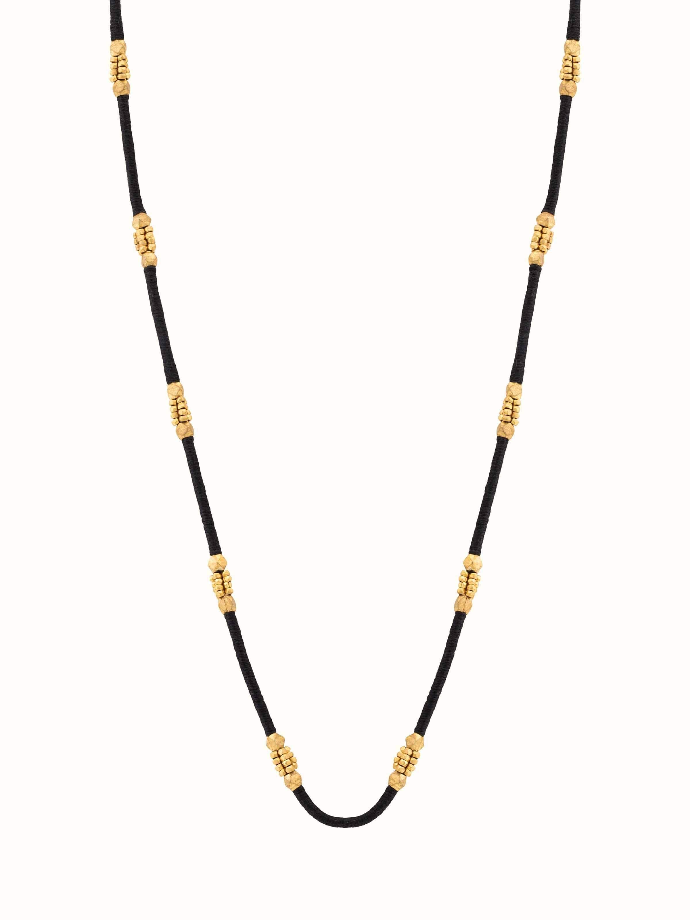 Front view of Dhokra Long Necklace featuring intricate metalwork designs