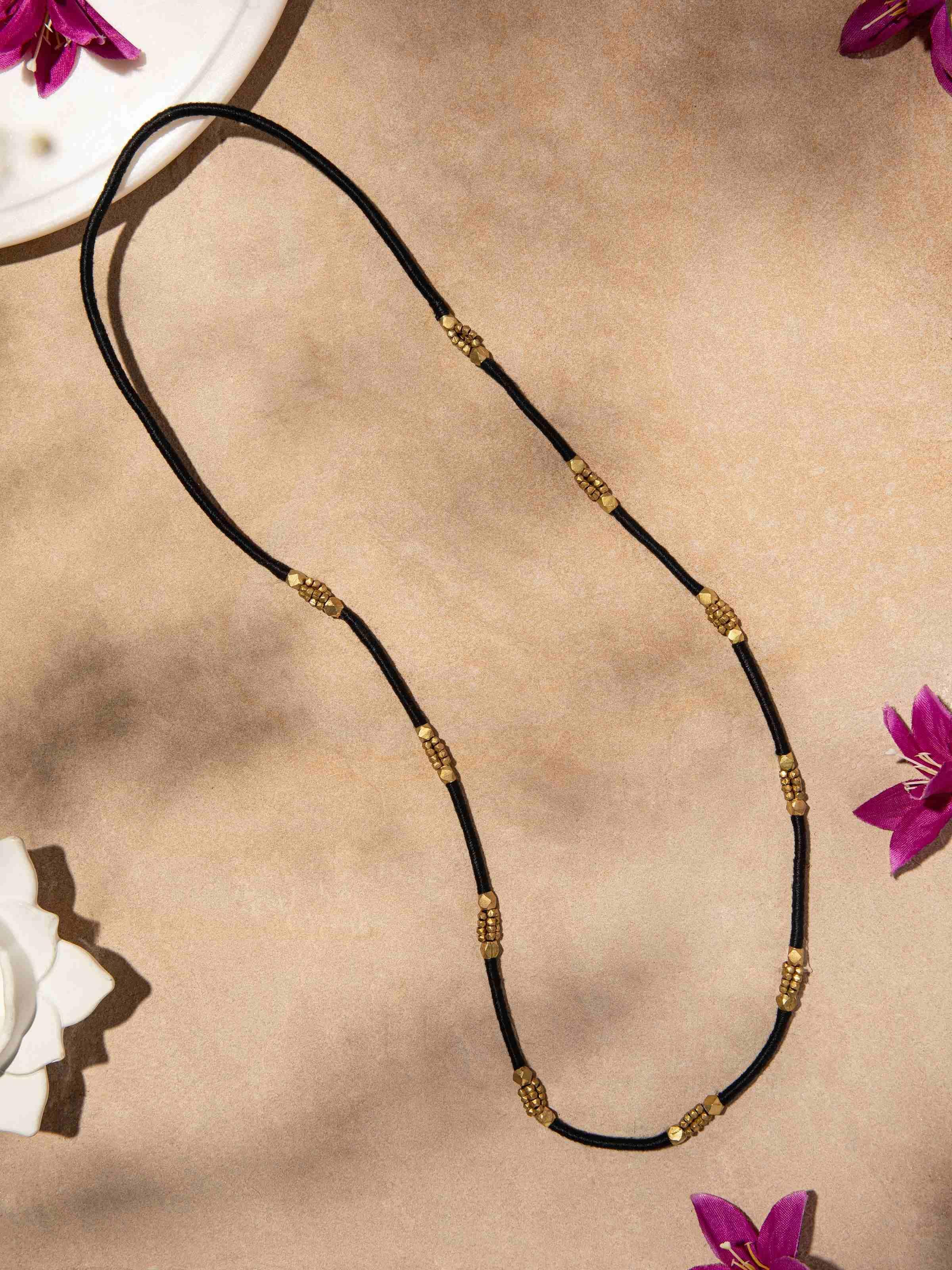 Close-up of Dhokra Long Necklace highlighting detailed craftsmanship