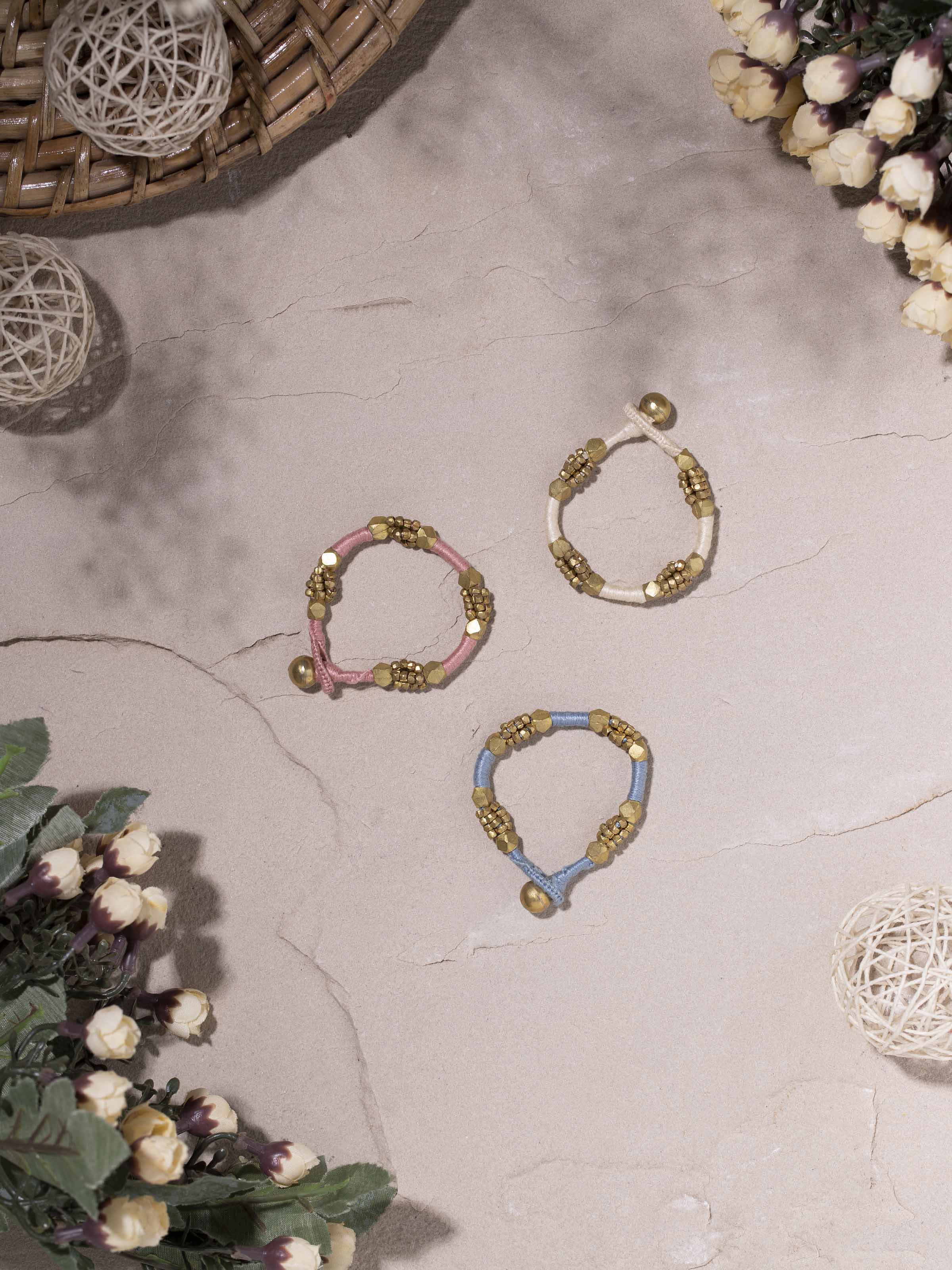 Side view of Dhokra Bracelet Set (2 pcs) showcasing the detailed tribal motifs and traditional craftsmanship