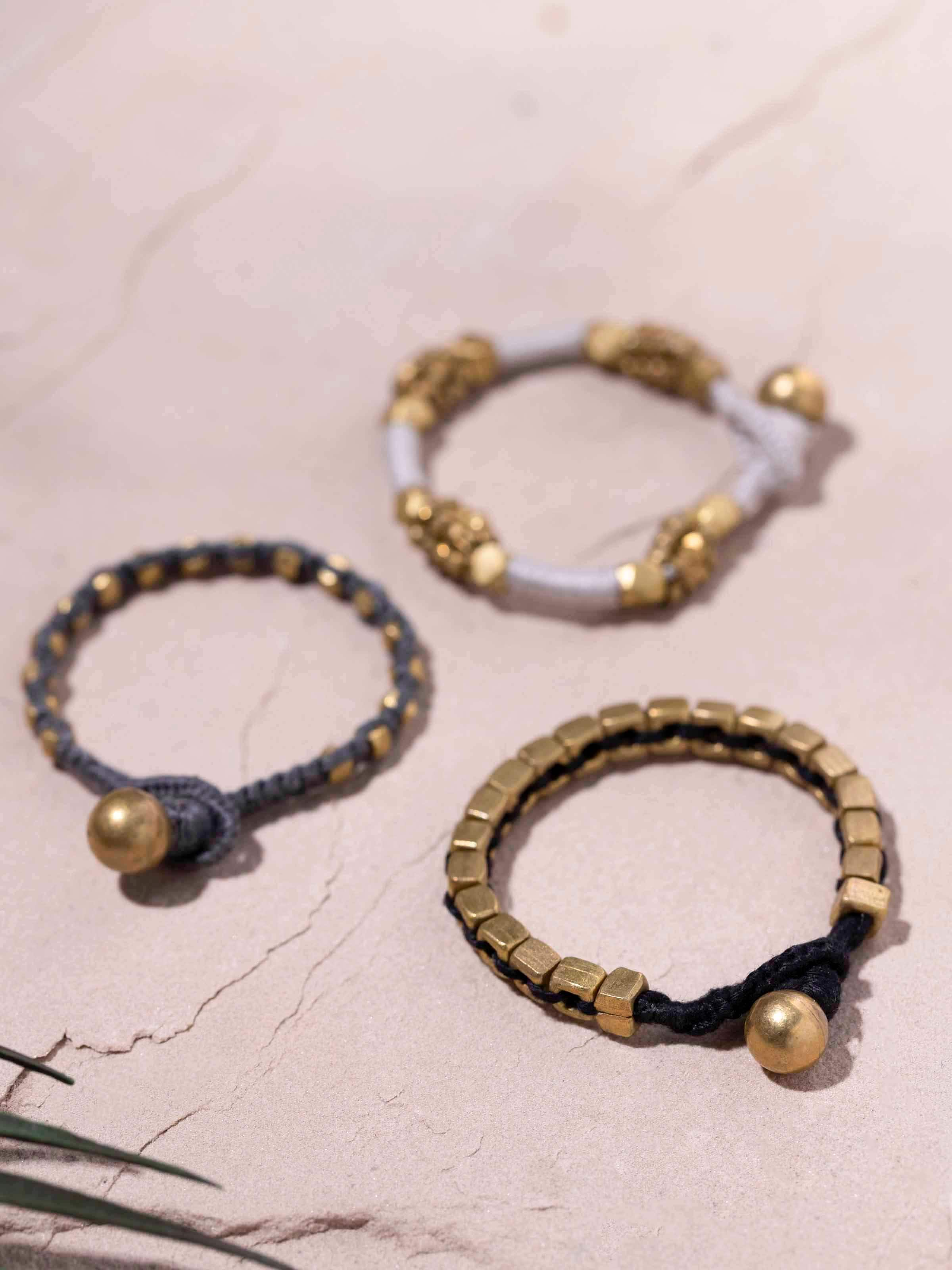 Detailed close-up of Dhokra bracelet set (3 pcs) showcasing texture and design