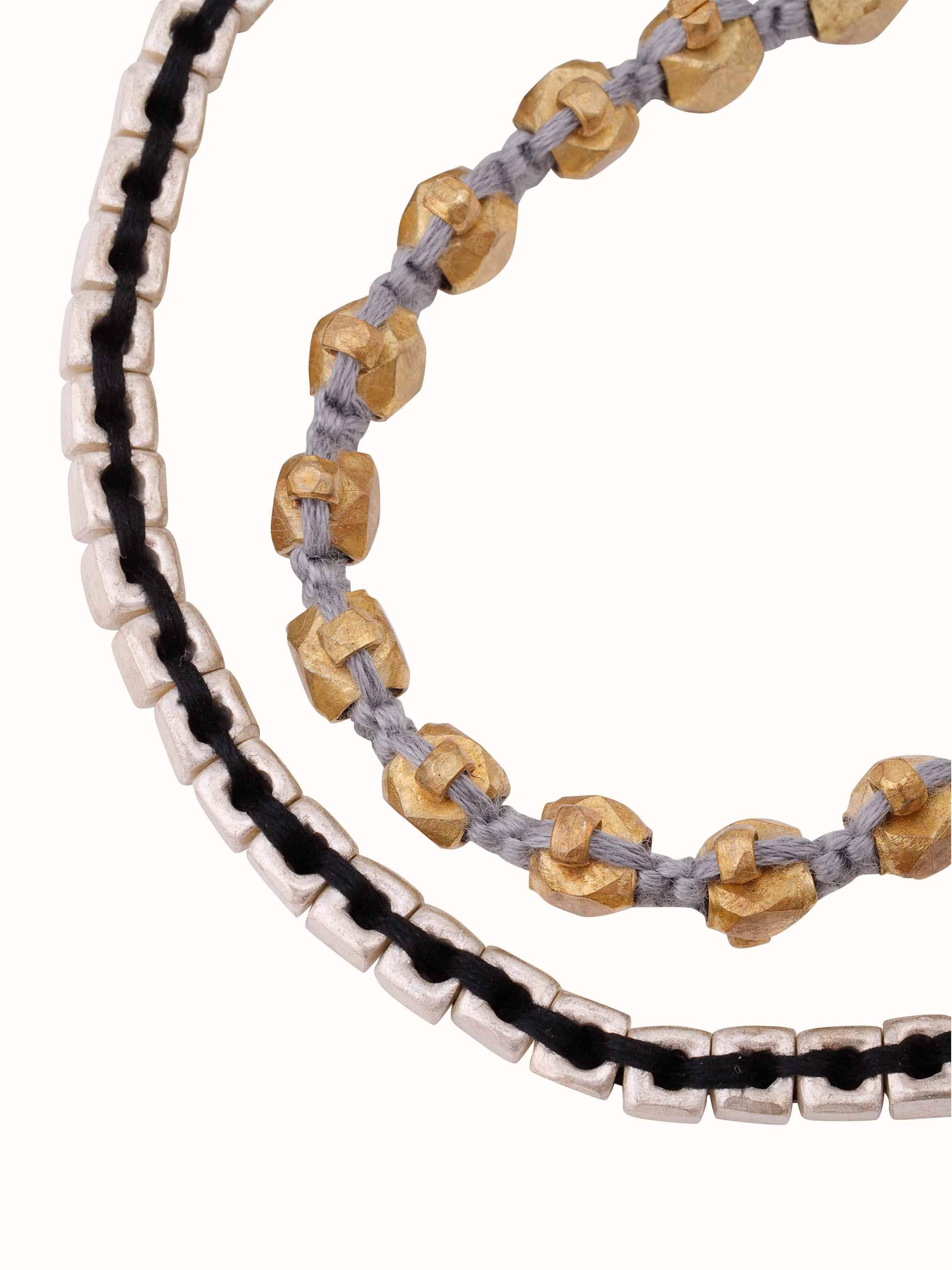 Angled view of Dhokra Bracelet Set of 2 showcasing the elegant traditional design and detailed metalwork.