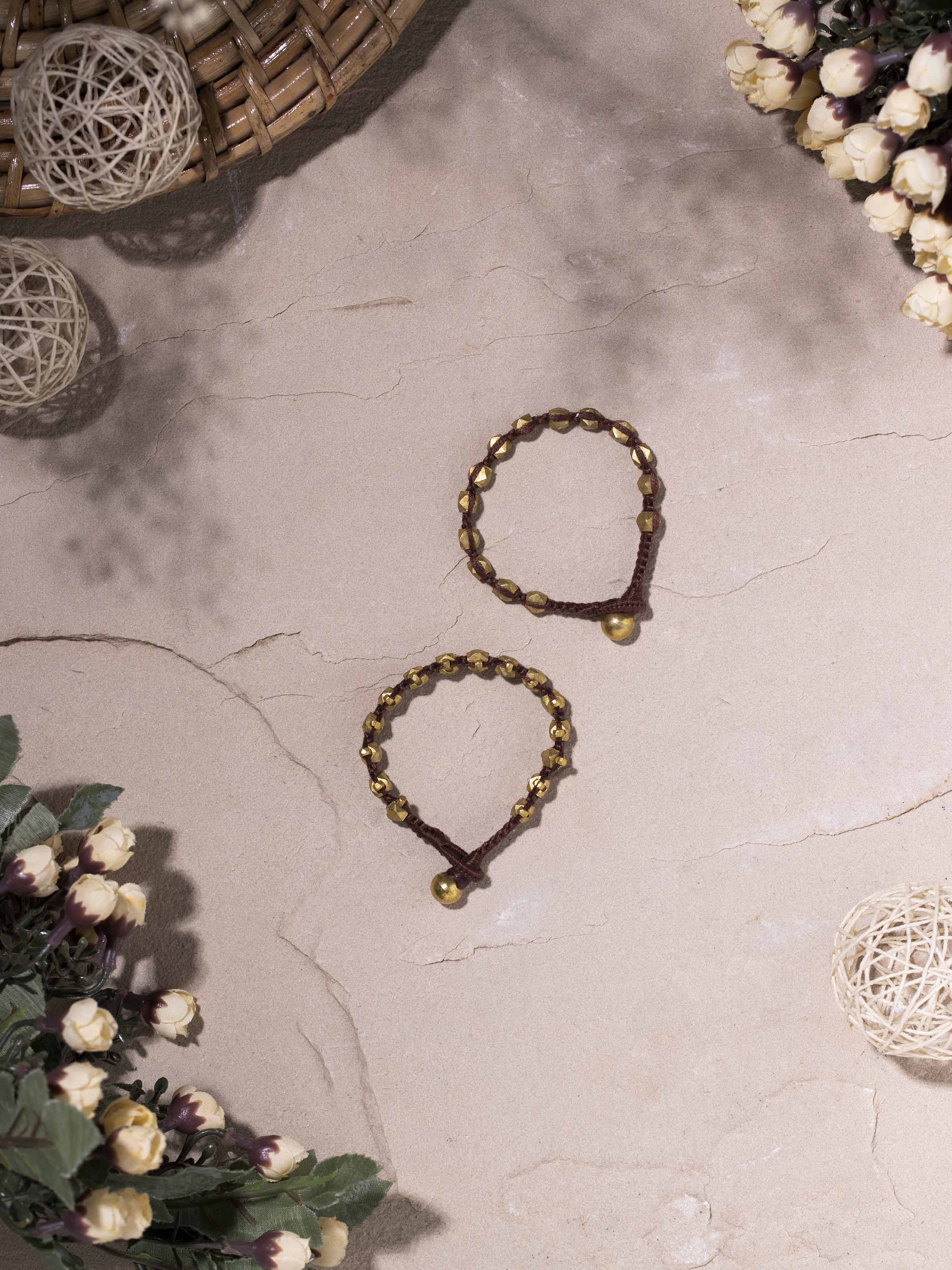 Side view of Dhokra Bracelet Set (2 pcs) highlighting the traditional design and patterns.