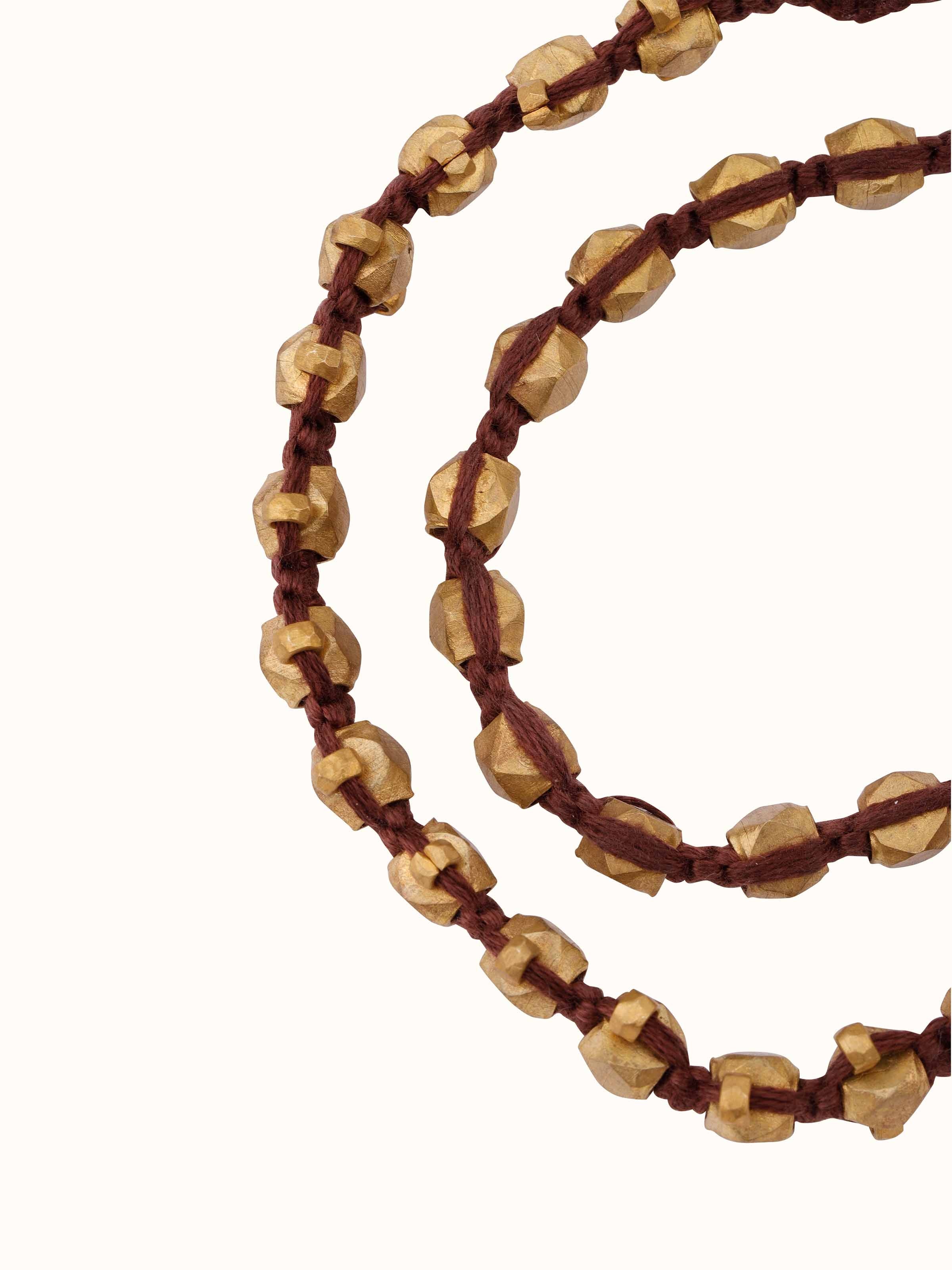 Angled view of Dhokra Bracelet Set (2 pcs) emphasizing the unique design and craftsmanship.