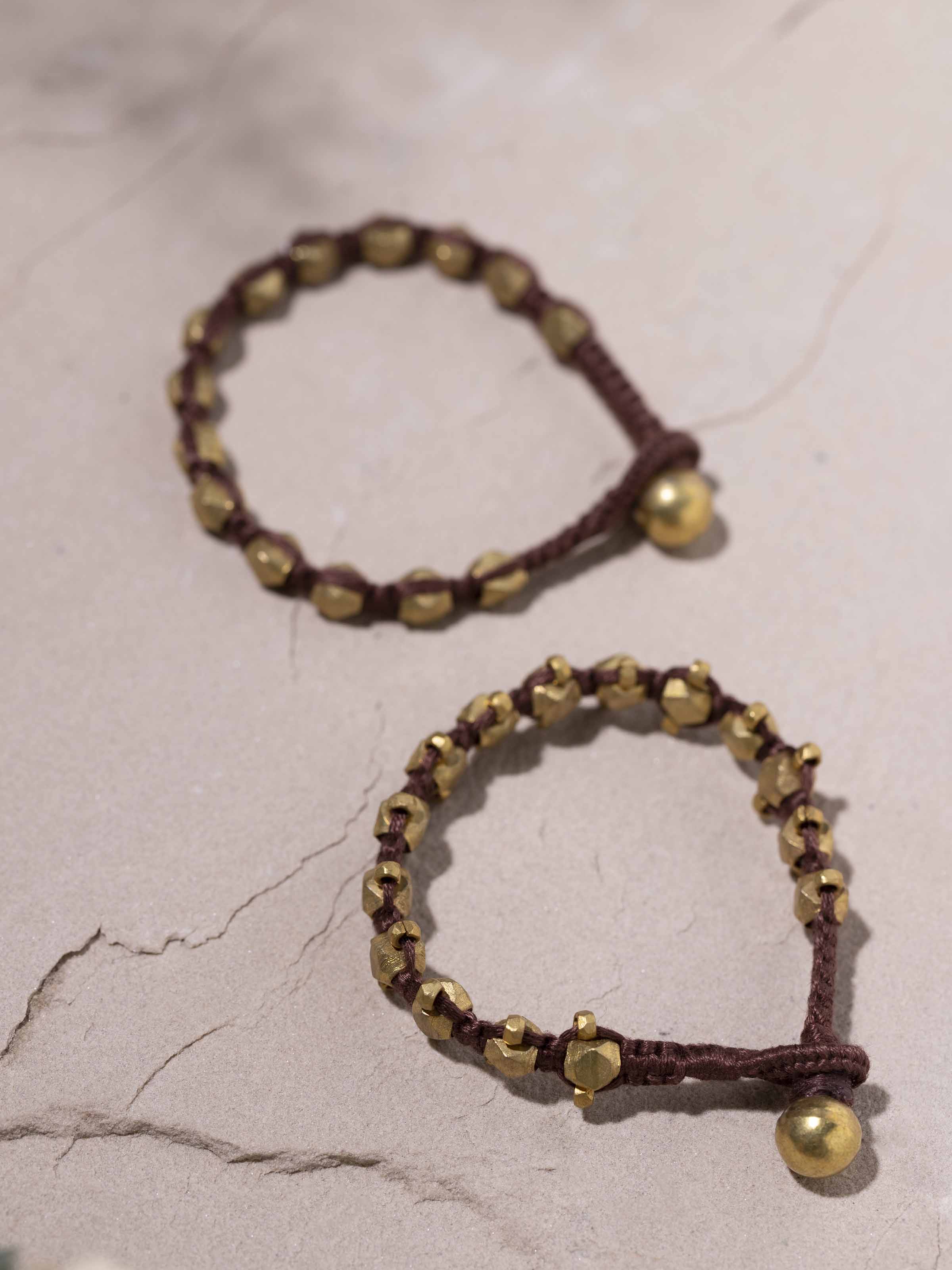 Detailed view of Dhokra Bracelet Set (2 pcs) showcasing intricate Dhokra metalwork.