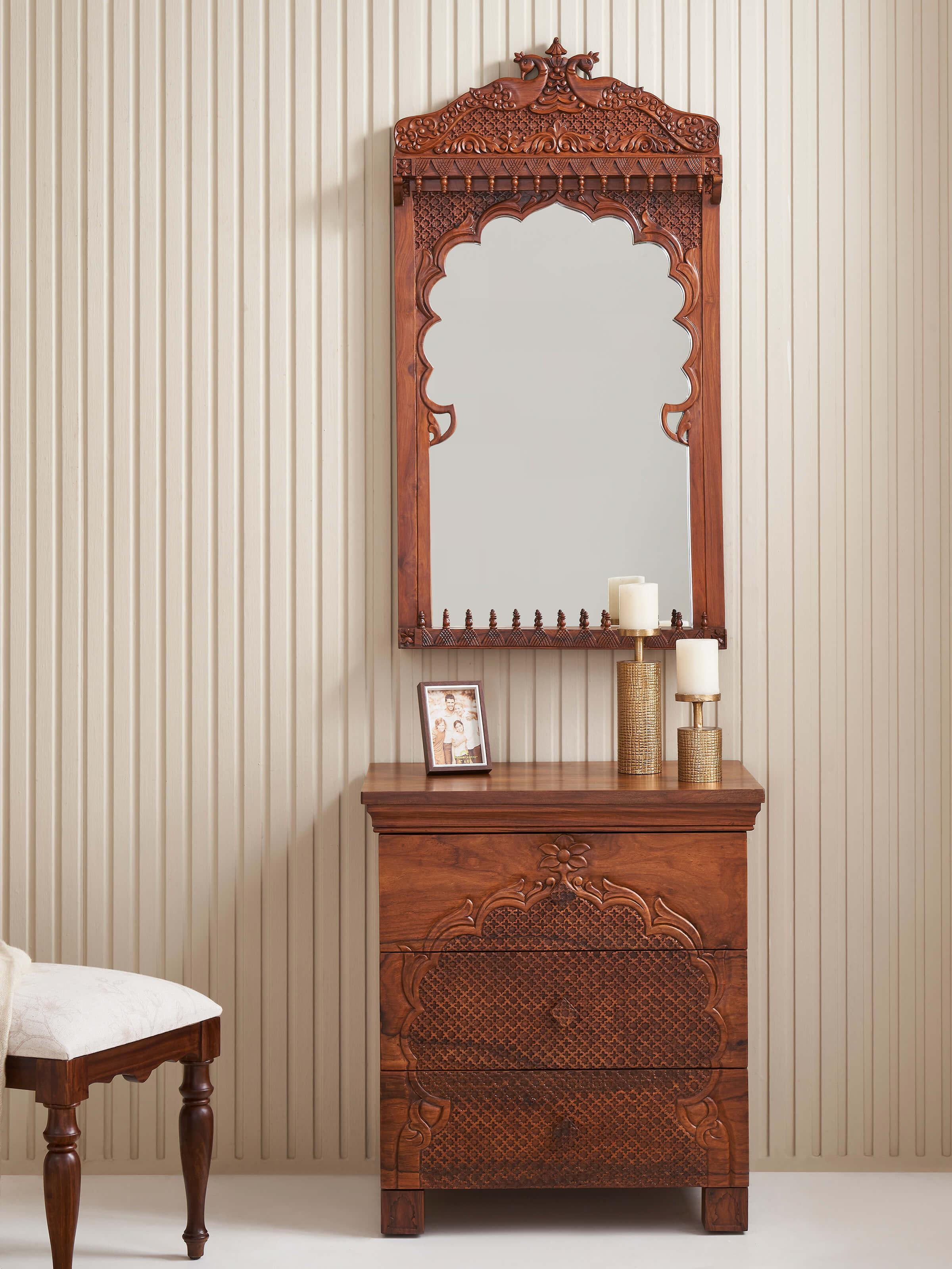 Side view of the Sheesham wood dressing table, showing intricate carvings and glass mirror