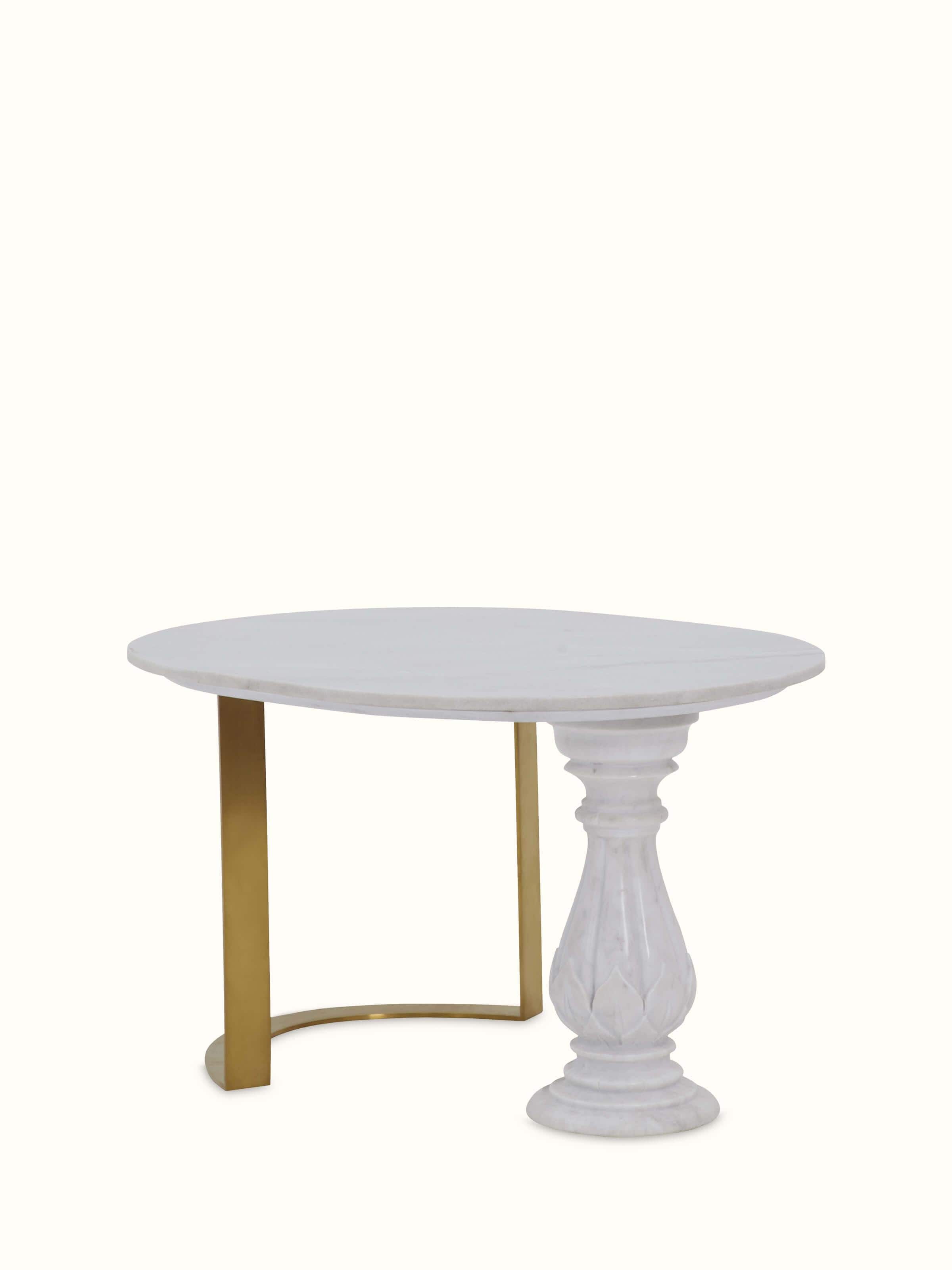Angled view of Carved Metal & Marble Top Coffee Table displaying the ornate metal details and the marble top