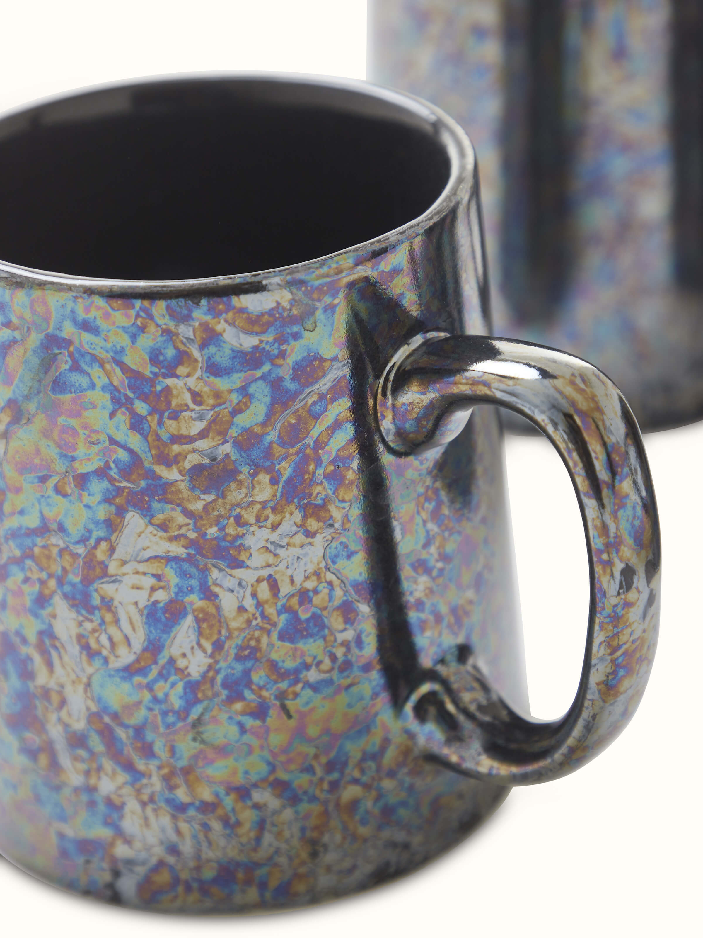 Close-up view of Khurja Pottery Ceramic Coffee Mugs in black (4 pcs) emphasizing the detailing and quality.
