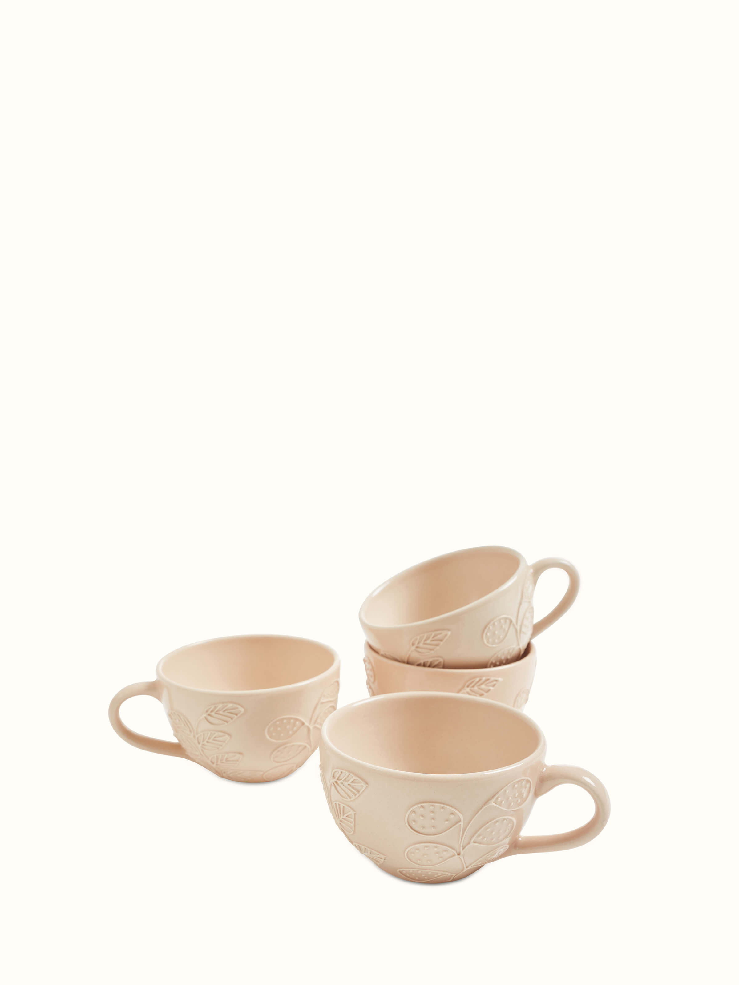 Close-up of pink Khurja pottery ceramic coffee mugs set of 4 showing fine details