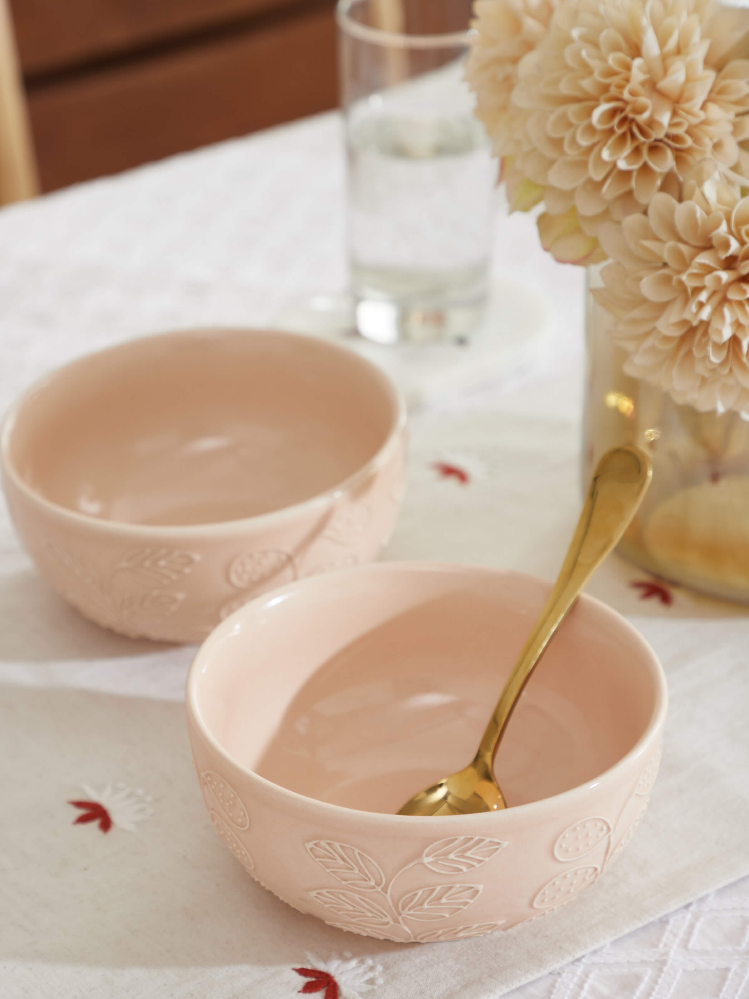 Side view of Khurja pottery ceramic nut bowls in pink highlighting smooth curves.