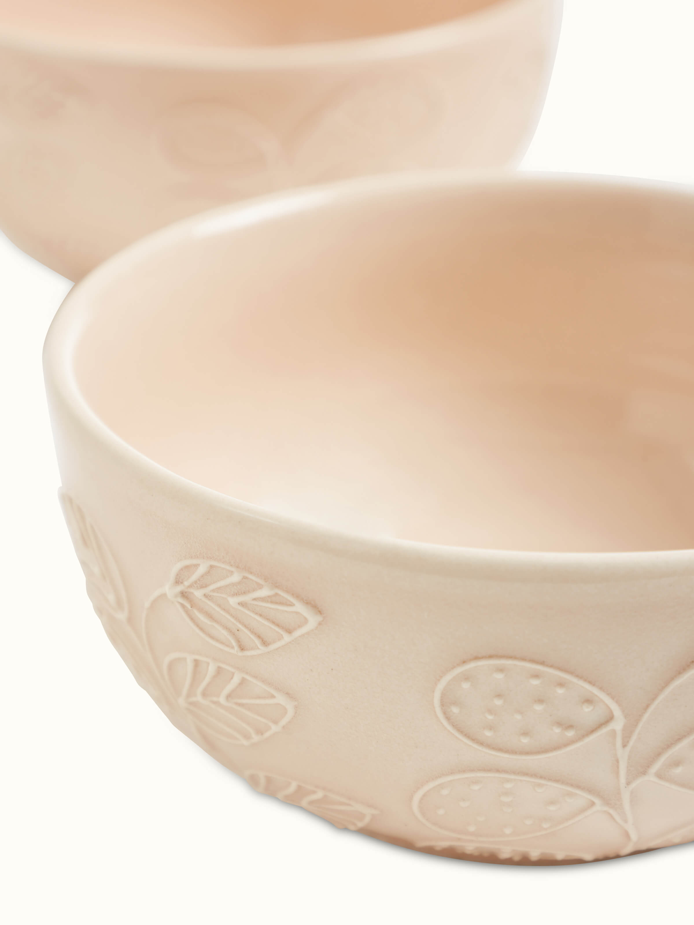 Detailed view of Khurja pottery ceramic nut bowls in pink showing texture and finish.