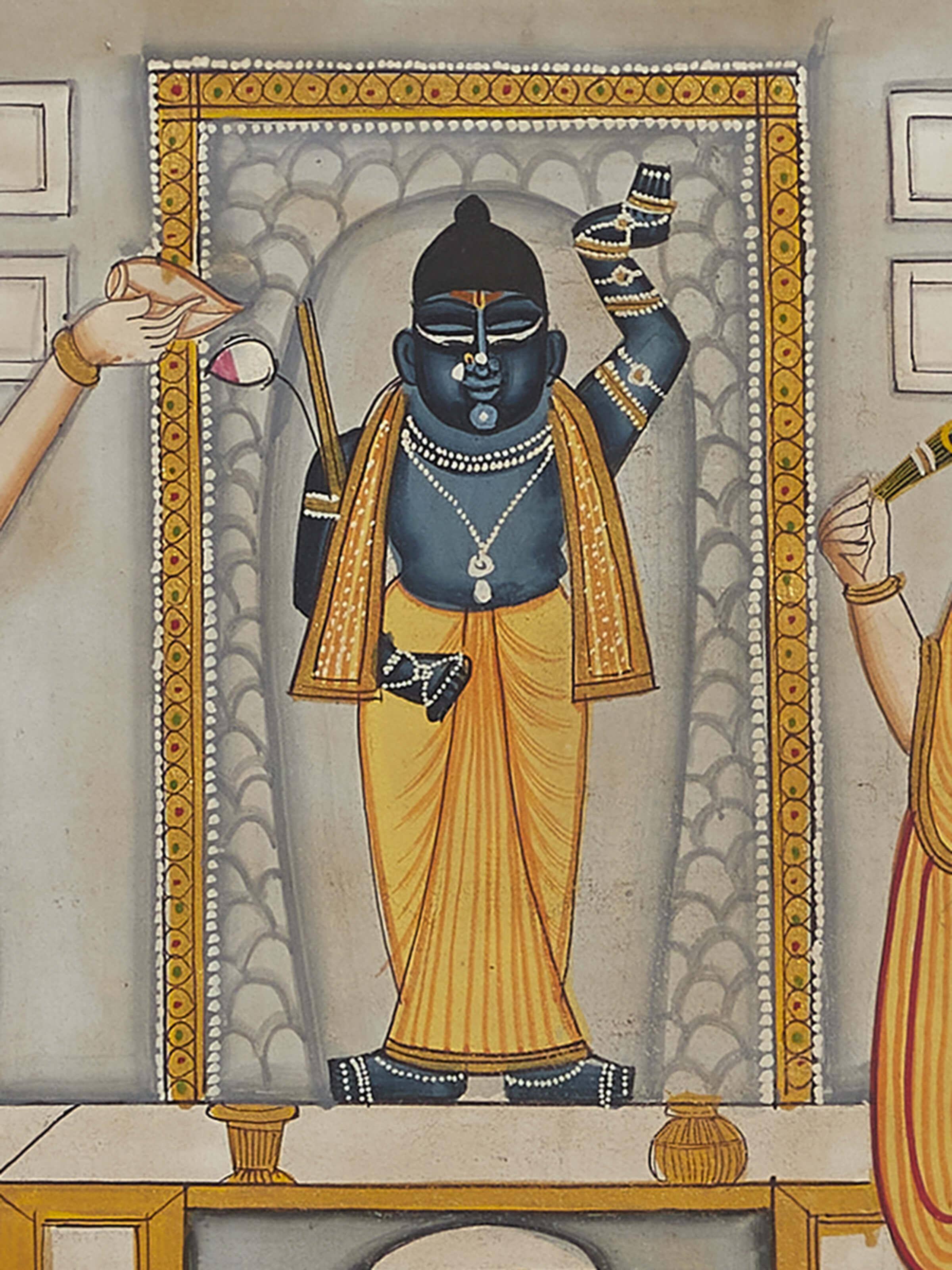 Detailed view showing Shreenathji and priests in vibrant attire, emphasizing traditional art.