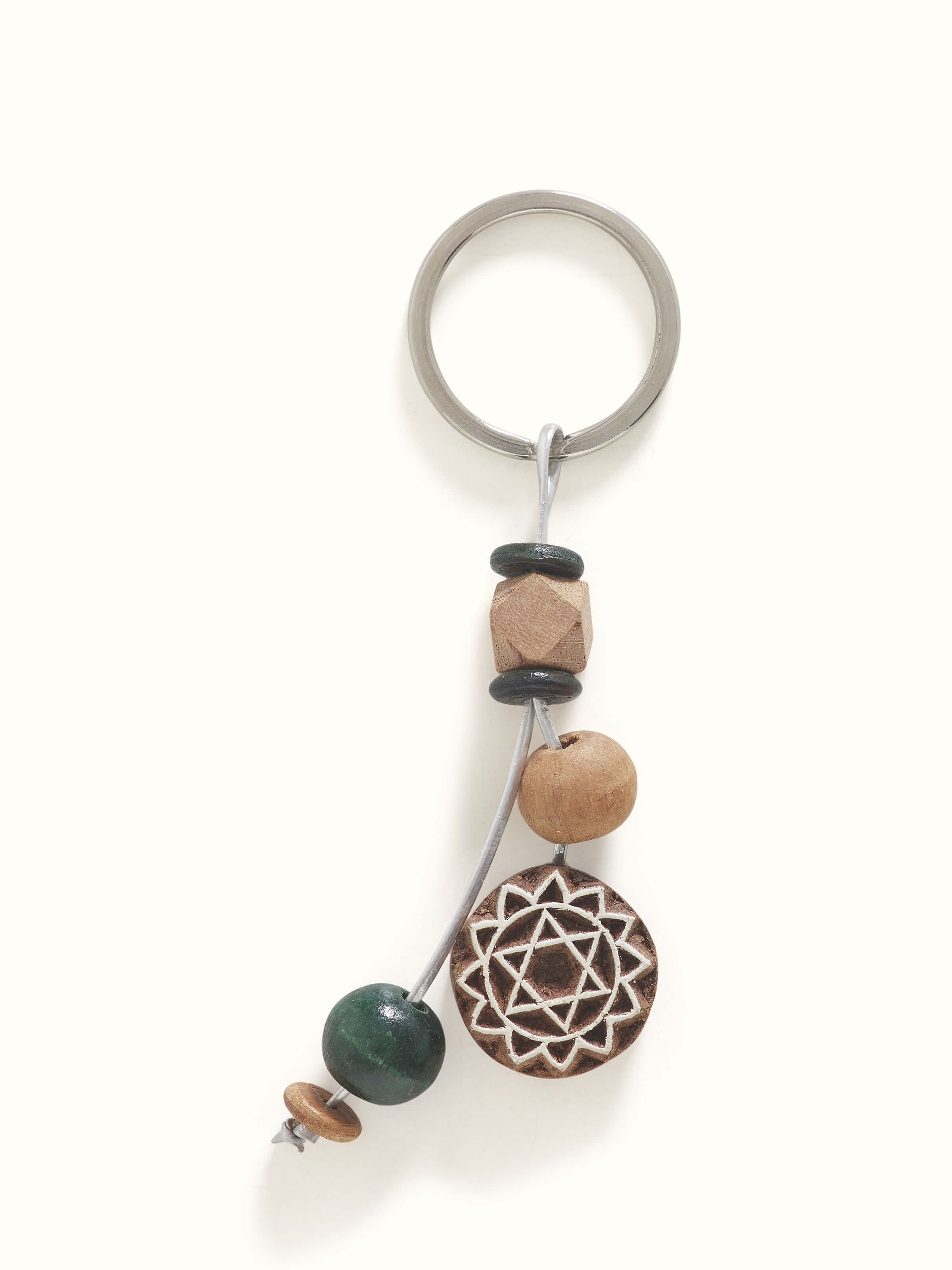 Brown block-making wooden keychain with detailed craftsmanship.