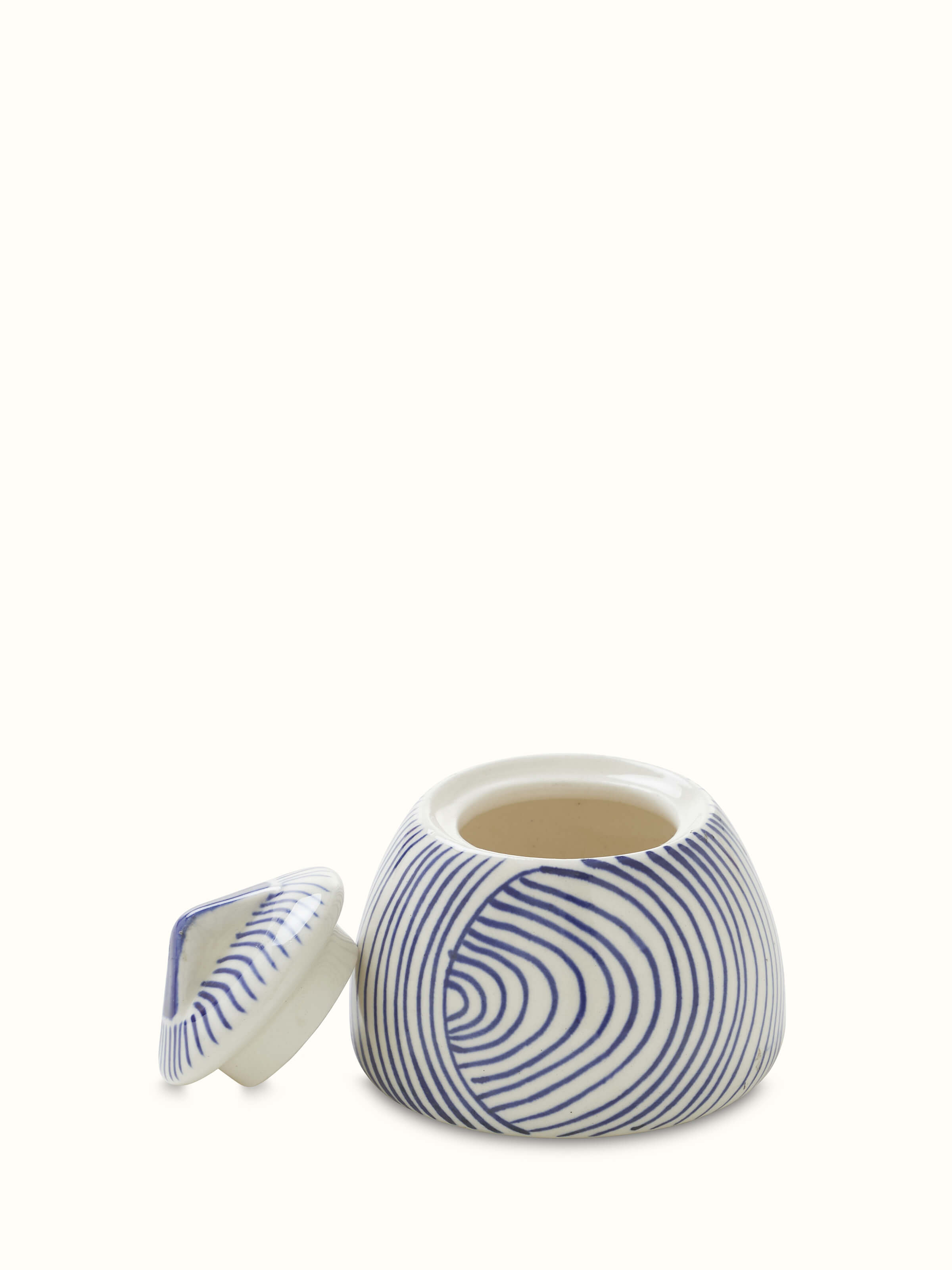 Detailed view of Khurja pottery stoneware demitasse cups, highlighting their traditional patterns and smooth texture.