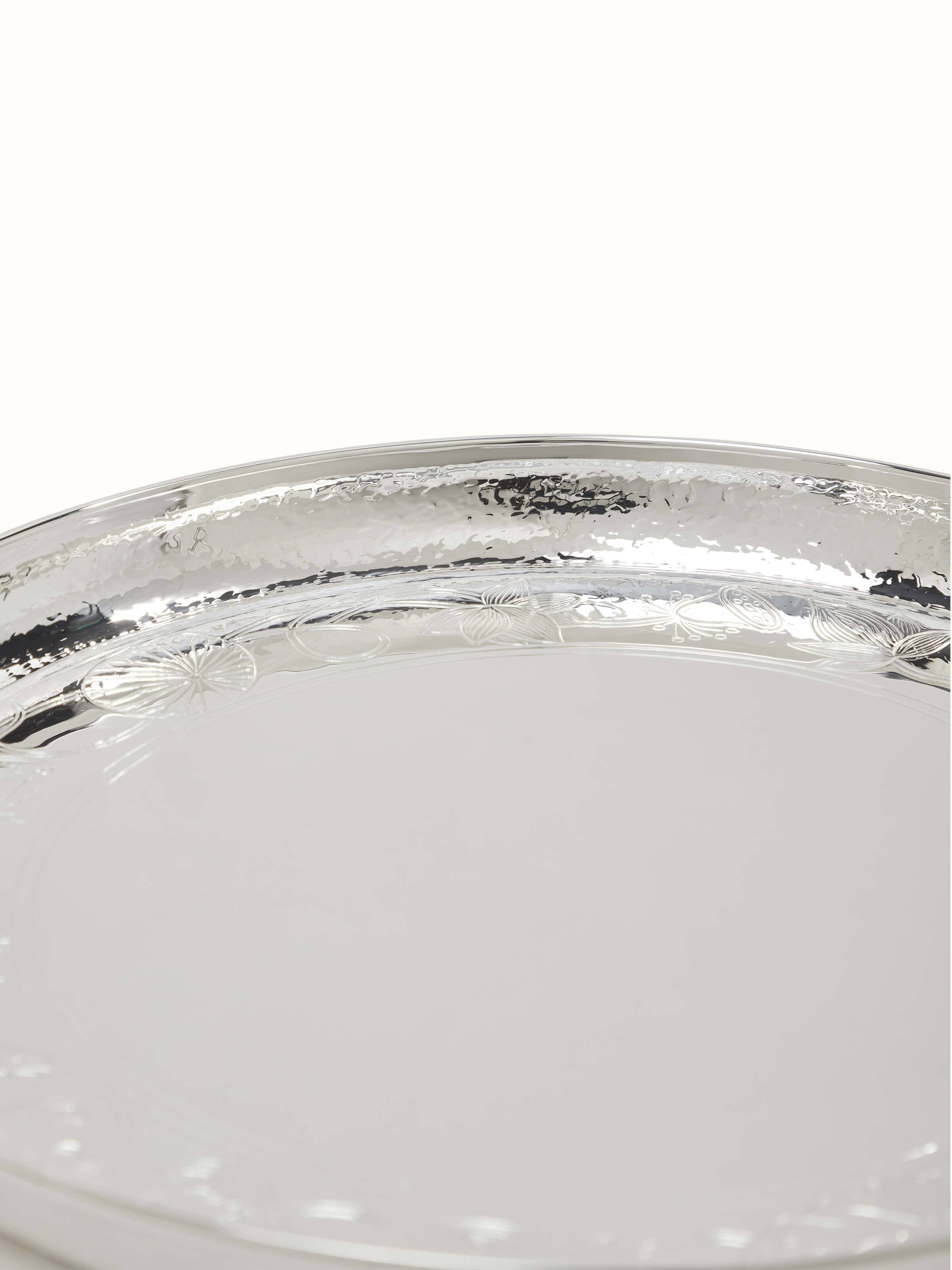 Close-up view of Silver Lotus Dinner Plate highlighting its exquisite finish