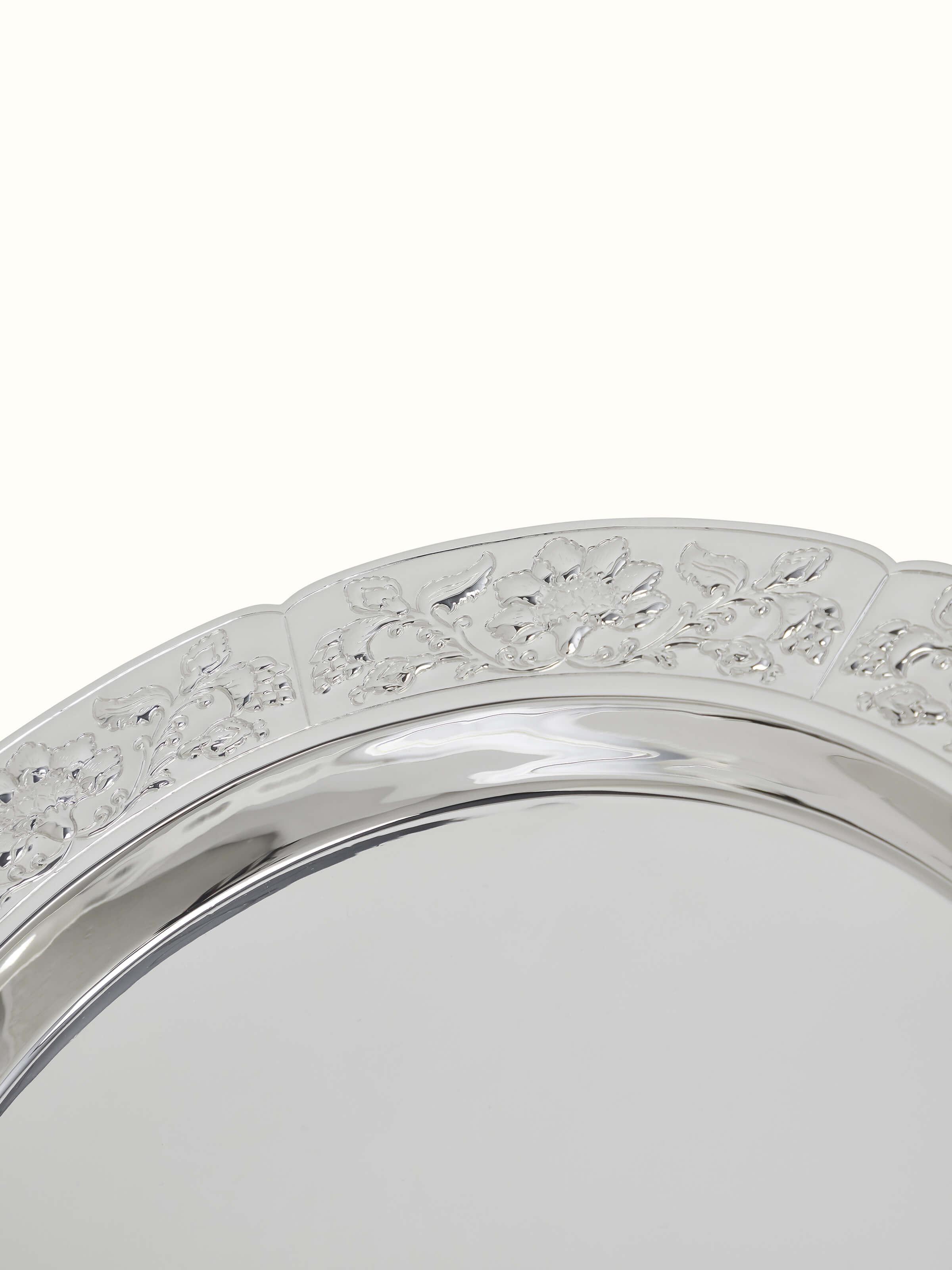 Close-up view of Kalamkari silver dinner plate showcasing the craftsmanship and detailed artwork