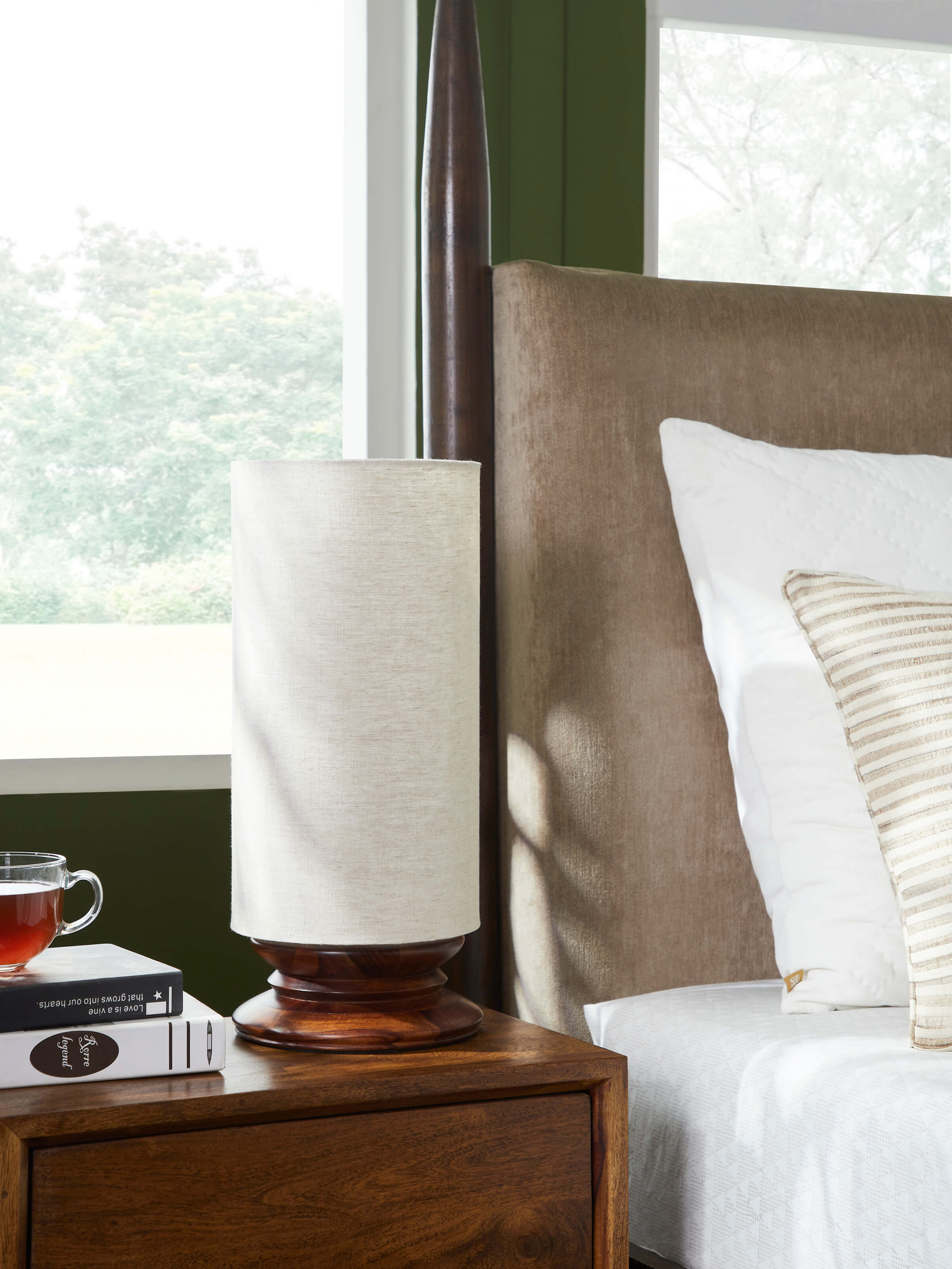 Side view of Wood & Cotton Fabric Table Lamp showcasing its base and fabric texture