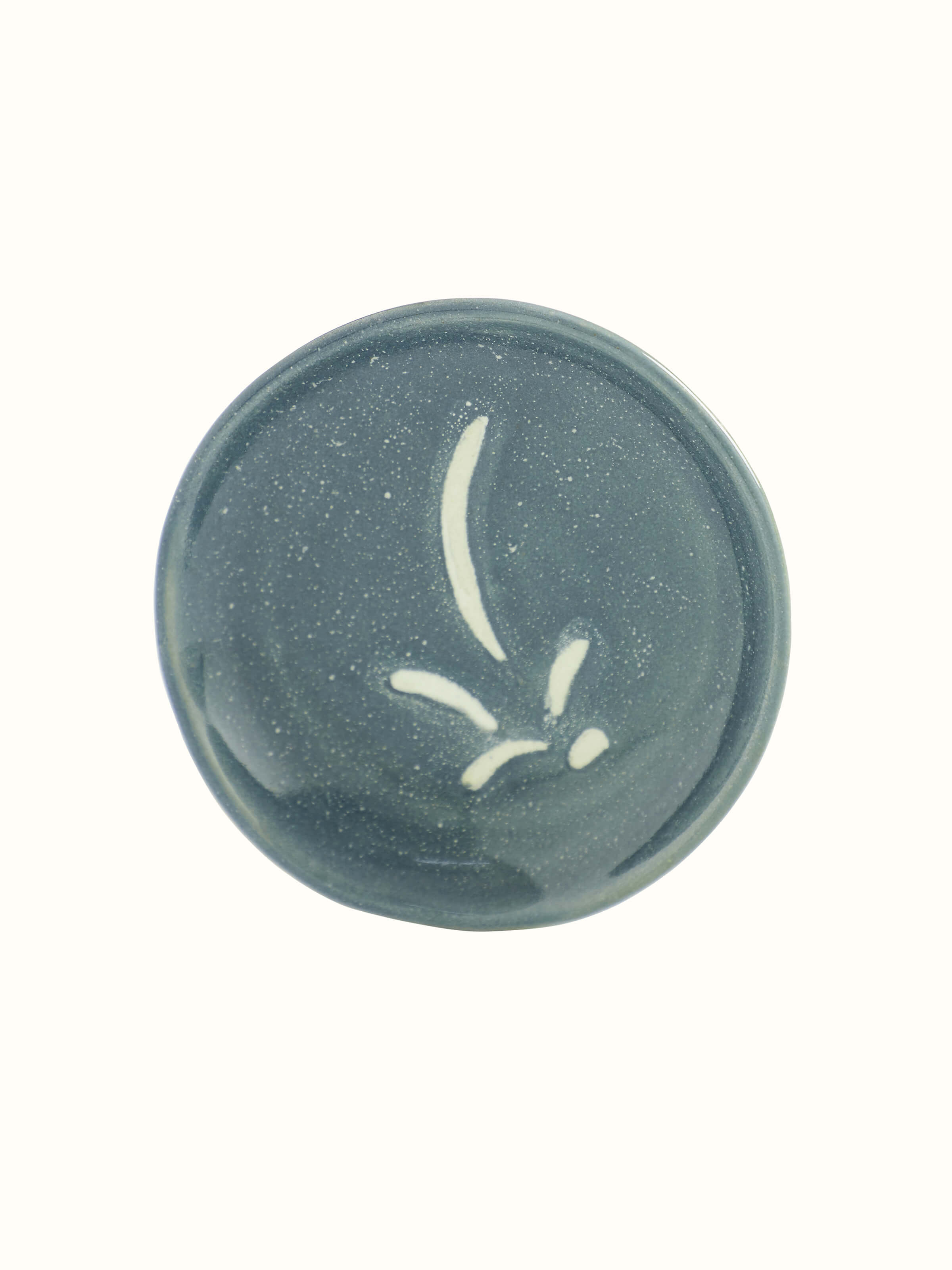 Side view of a grey studio pottery ceramic salad plate, emphasizing its minimalist design and contemporary style.