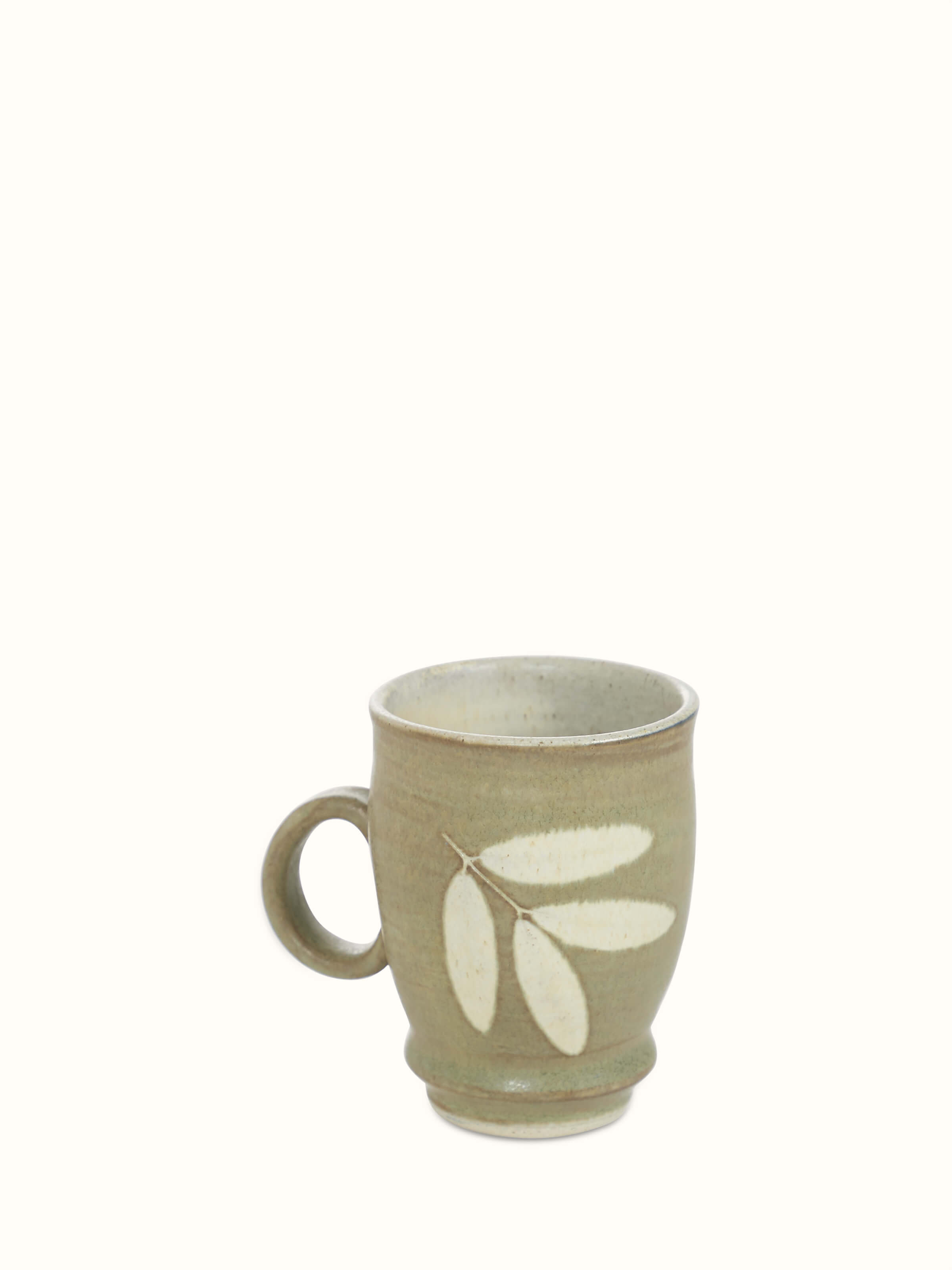 Front view of Studio pottery ceramic coffee mug in olive color highlighting its elegant design
